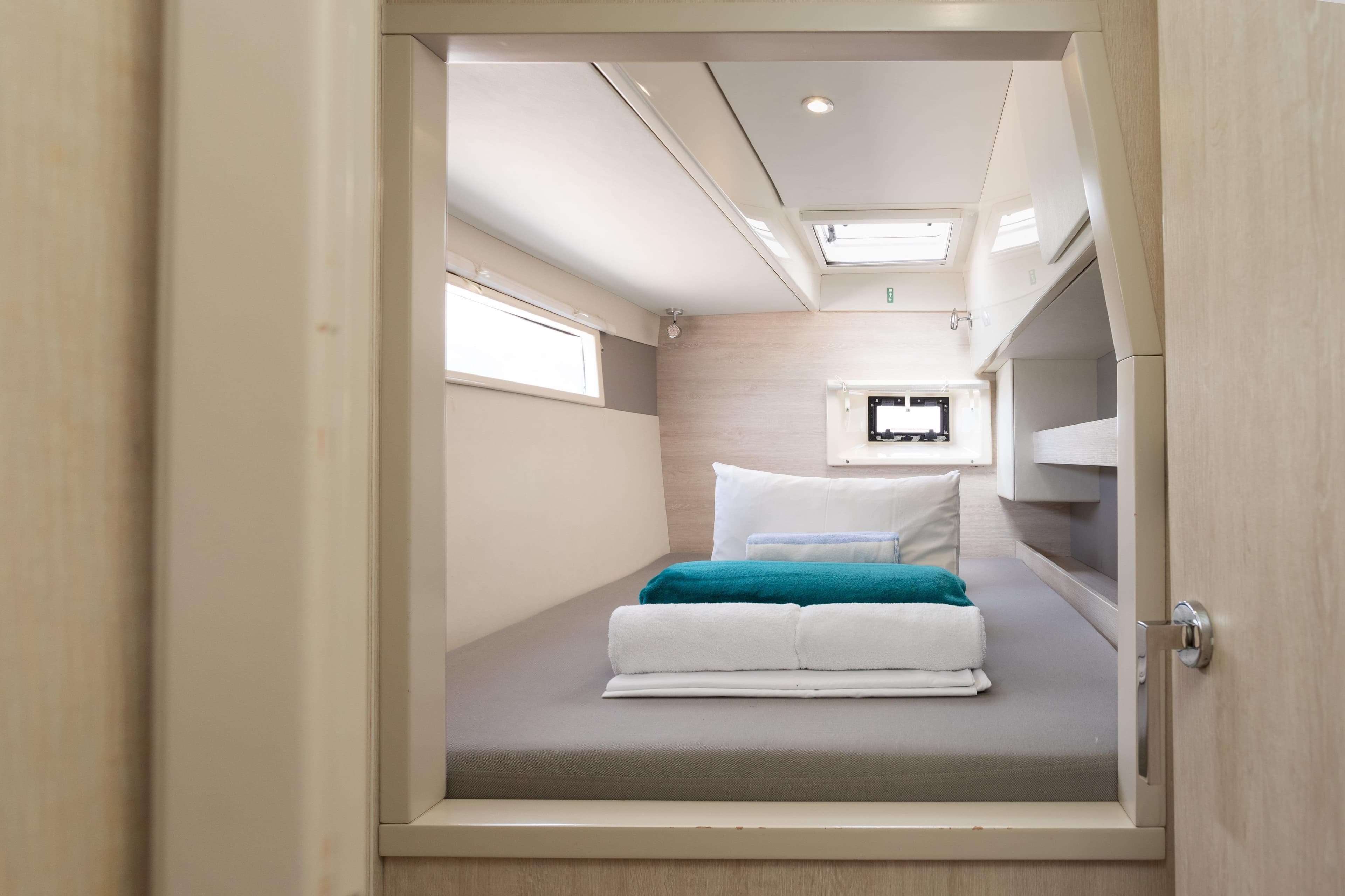 Interior cabin of 2016 Leopard 40 yacht with bed and modern design.
