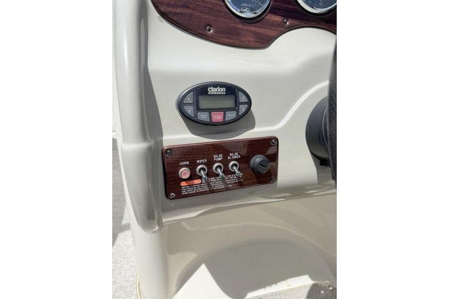Dashboard controls of a 2005 Sea Ray 220 Sundeck boat.