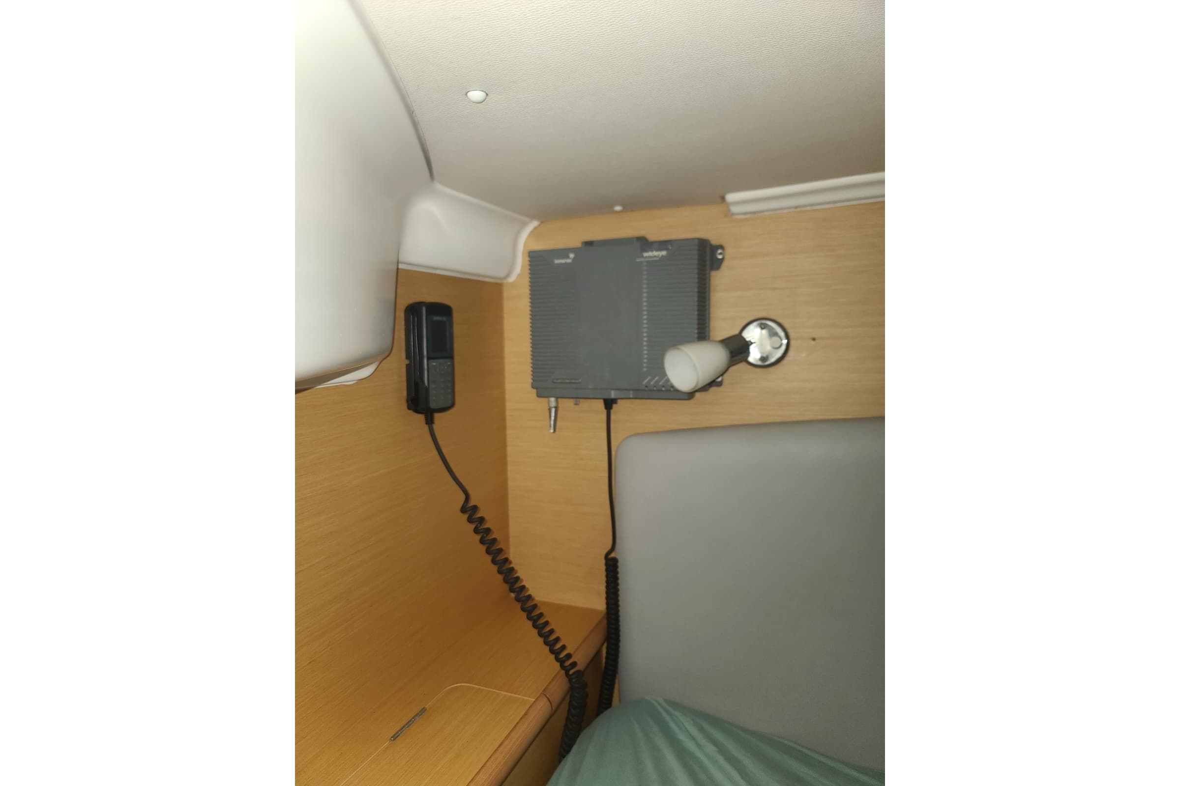 Interior of 2008 Lagoon 440 yacht with communication device and wall-mounted light.