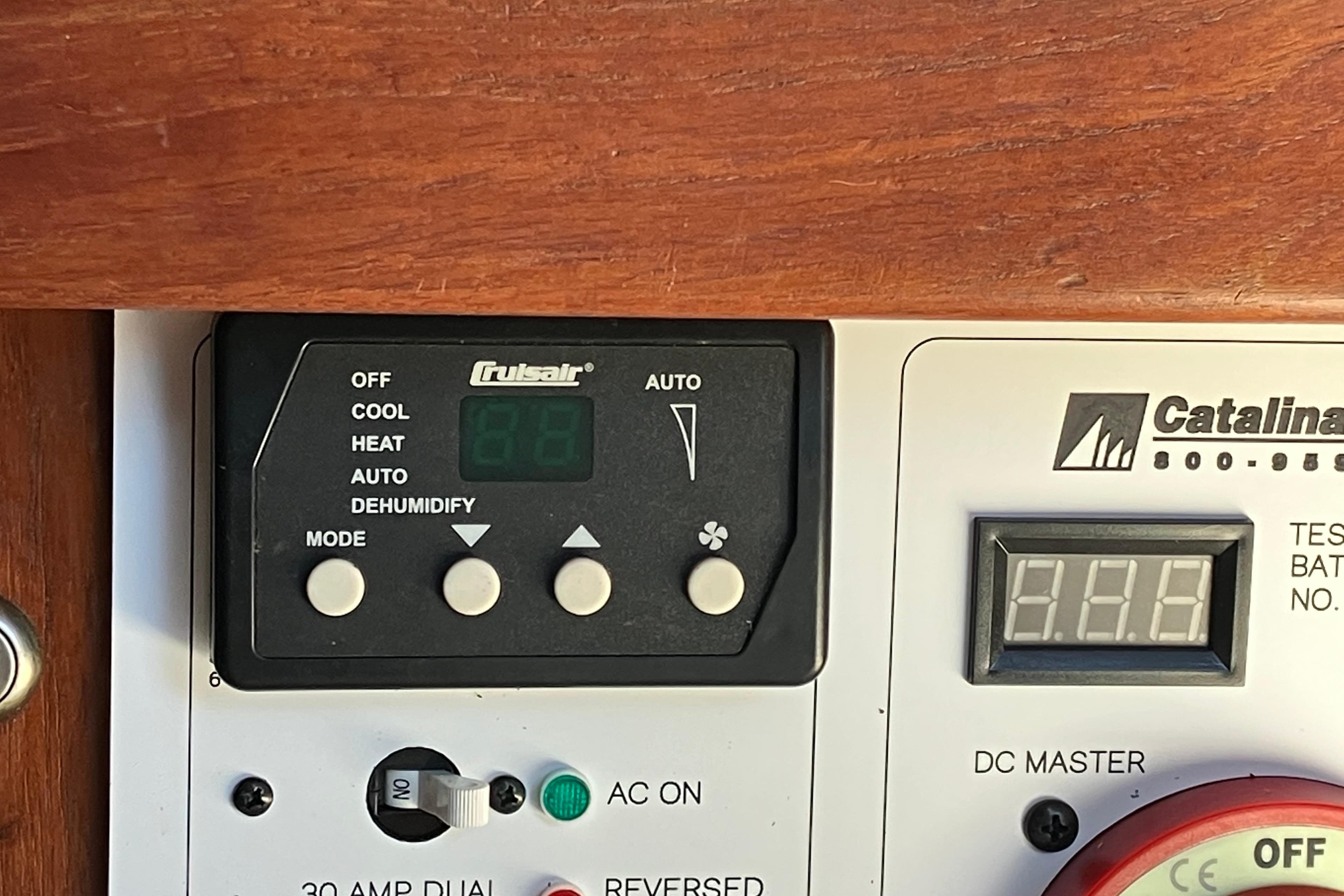 Control panel of a 1985 Catalina 30 boat with Crusair system settings.