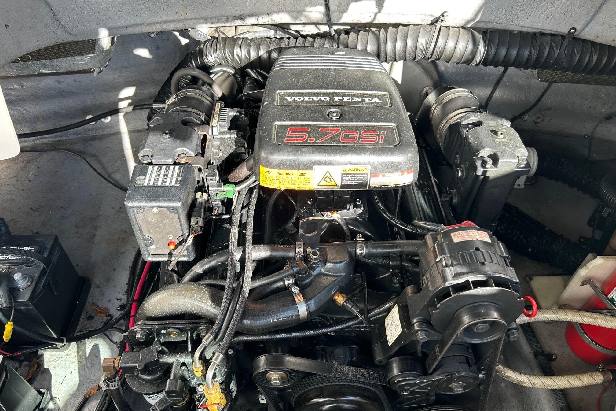 Engine compartment of a 2001 Chaparral 235 SSi with Volvo Penta 5.7GSi engine.