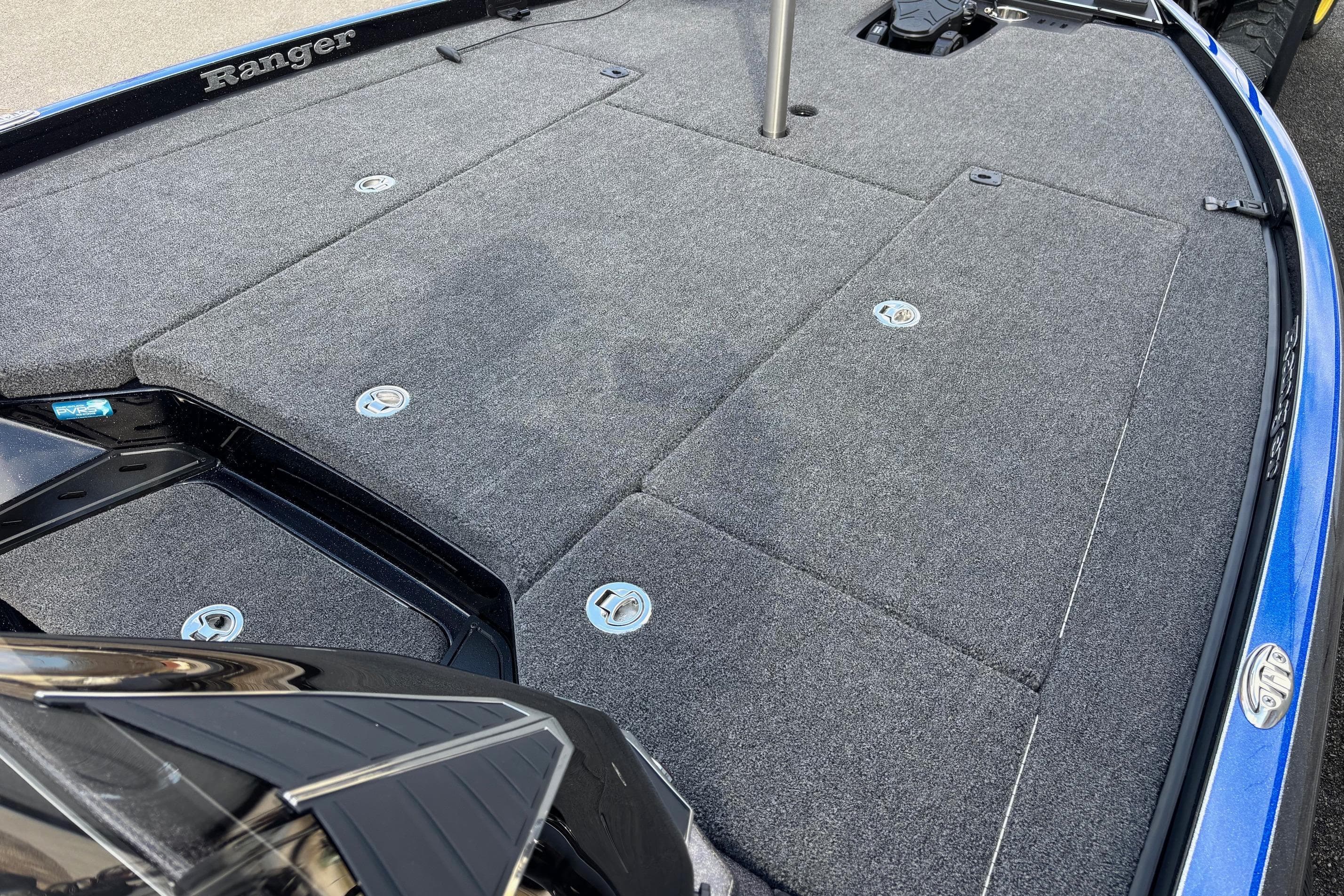 2026 Ranger Z520R boat deck with gray carpet and storage compartments.