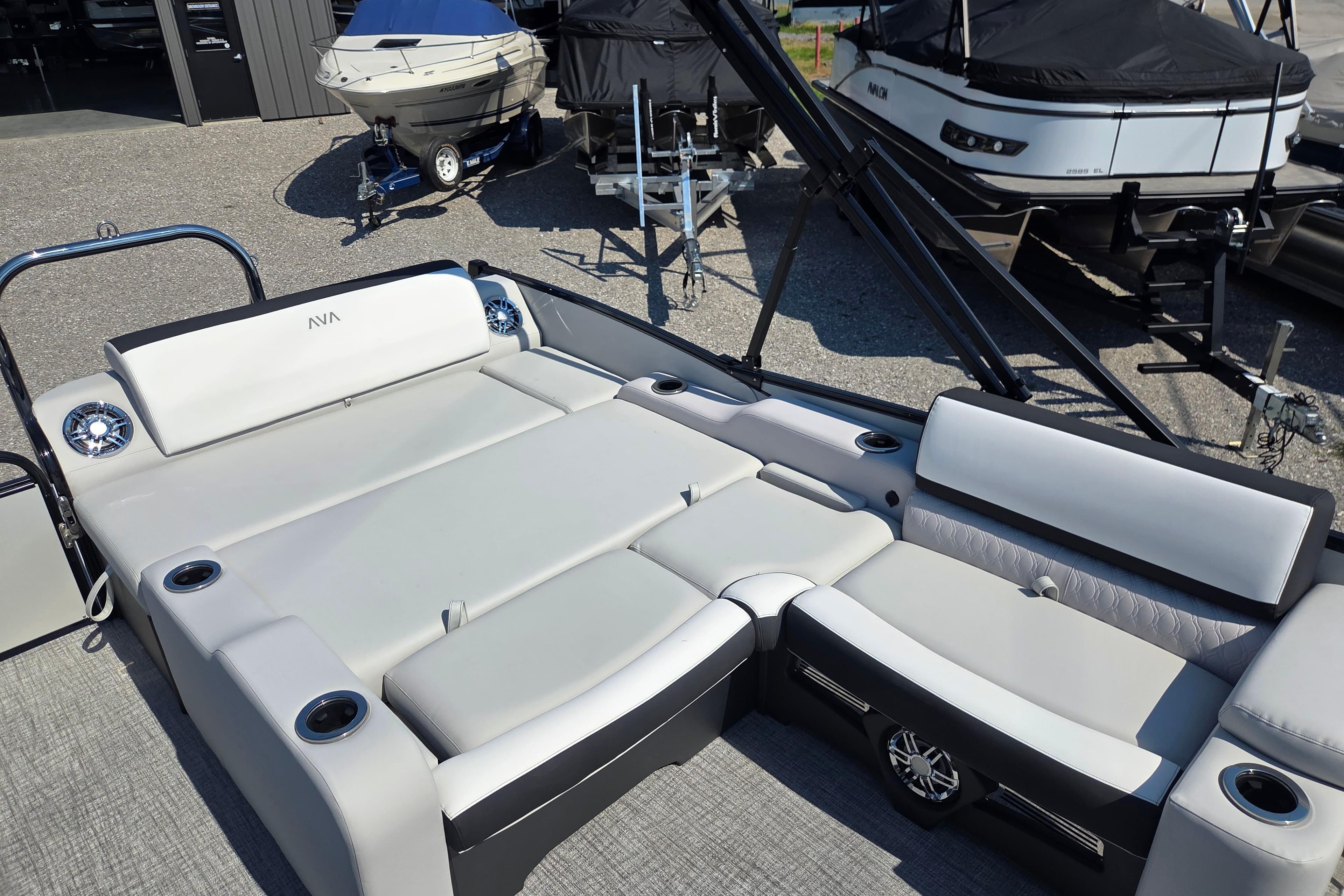 2026 Avalon Platinum Catalina 2585 Versatile Rear Lounger with luxurious seating and cup holders.