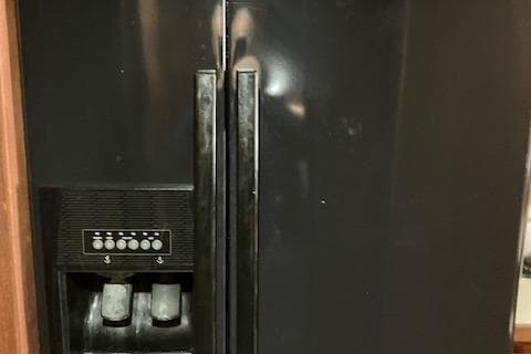 1983 Viking Convertible refrigerator with dual doors and built-in ice dispenser.