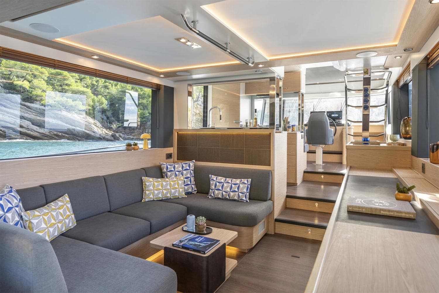 Manufacturer Provided Image: Luxurious interior of 2026 Beneteau Swift Trawler 54 with modern seating and scenic views.