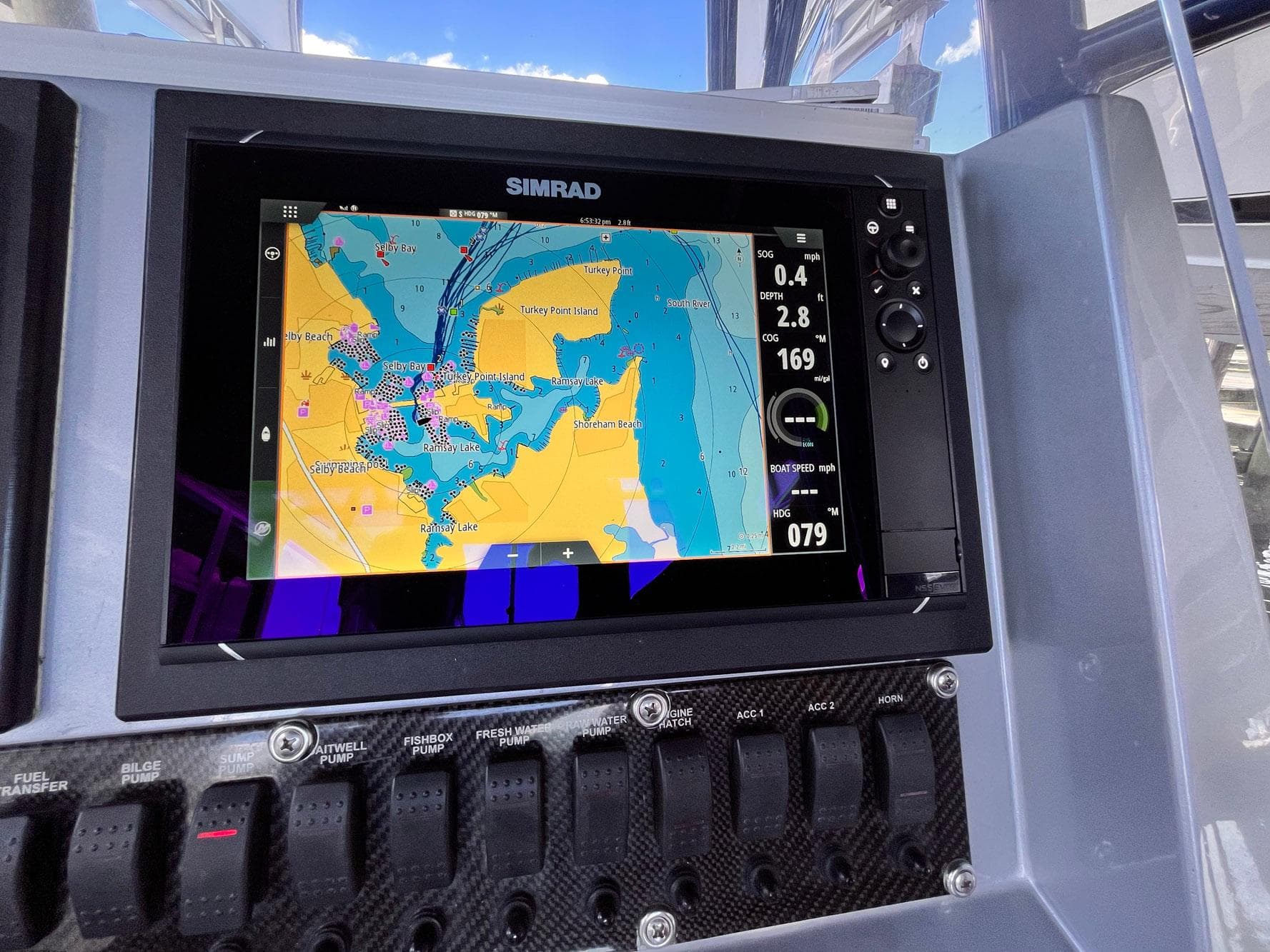 Simrad navigation display on 2011 Statement 380 Open boat dashboard.