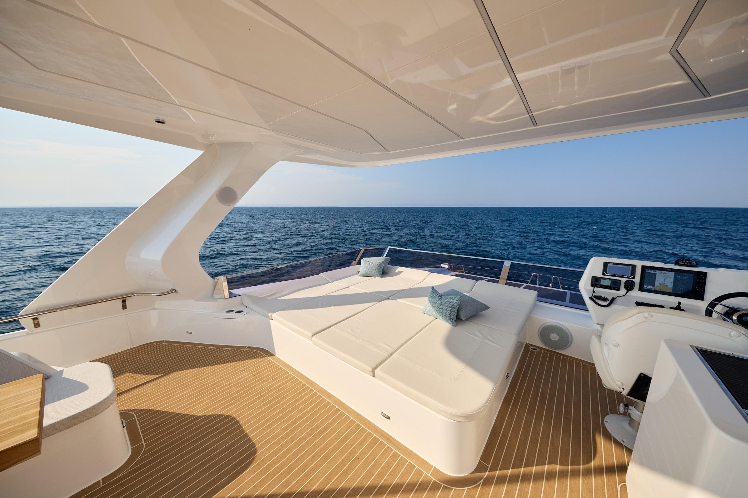 Luxurious 2025 Omaya 50 Power Catamaran deck with ocean view and modern helm.