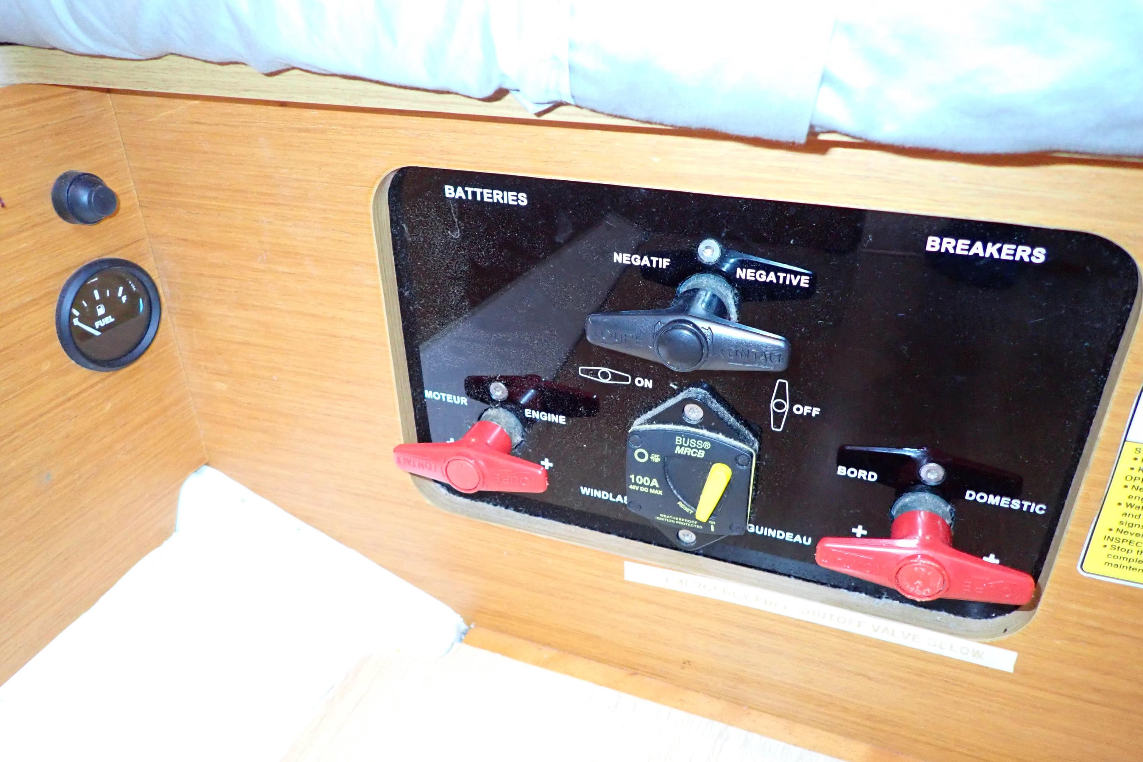 Control panel of a 2018 Jeanneau Sun Odyssey 389 sailboat, featuring battery and breaker switches.