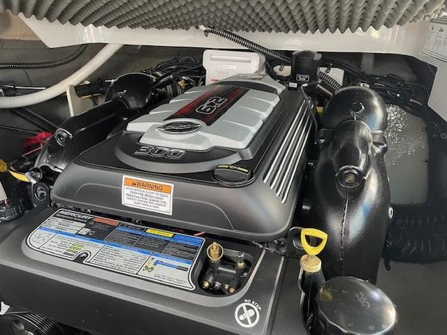 2023 Crownline 270 CR engine compartment with detailed view of the engine components.
