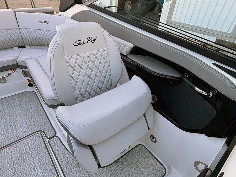 Luxurious interior of 2025 Sea Ray SLX 260 Outboard with plush seating and elegant design.
