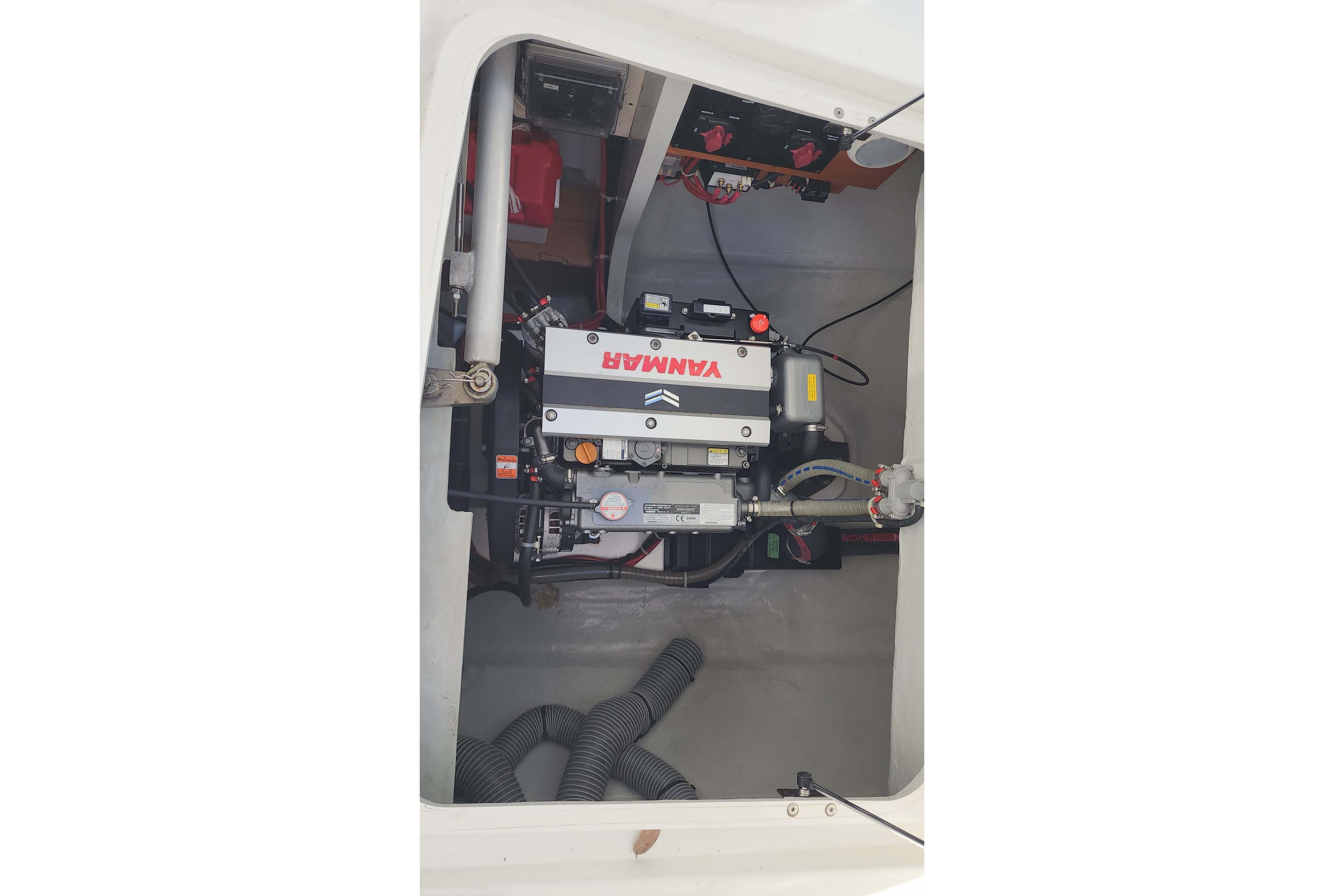 Engine compartment of a 2020 Lagoon 42 catamaran featuring a Yanmar engine.