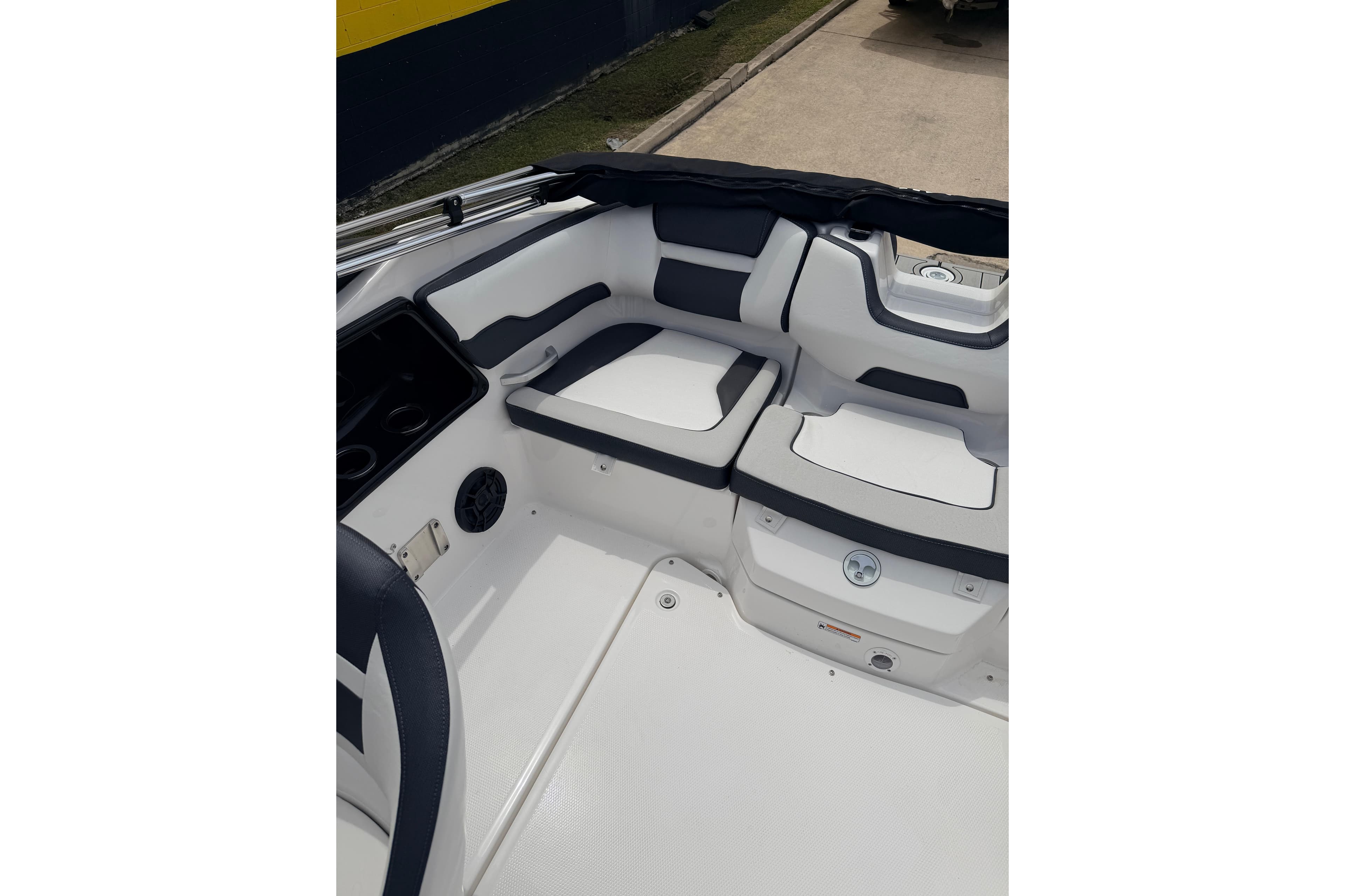 2026 Yamaha Boats SX195 interior seating with sleek white and gray design.