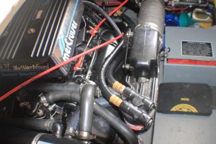 Engine compartment of a 1992 Tollycraft 34 Sport Sedan with MerCruiser components.