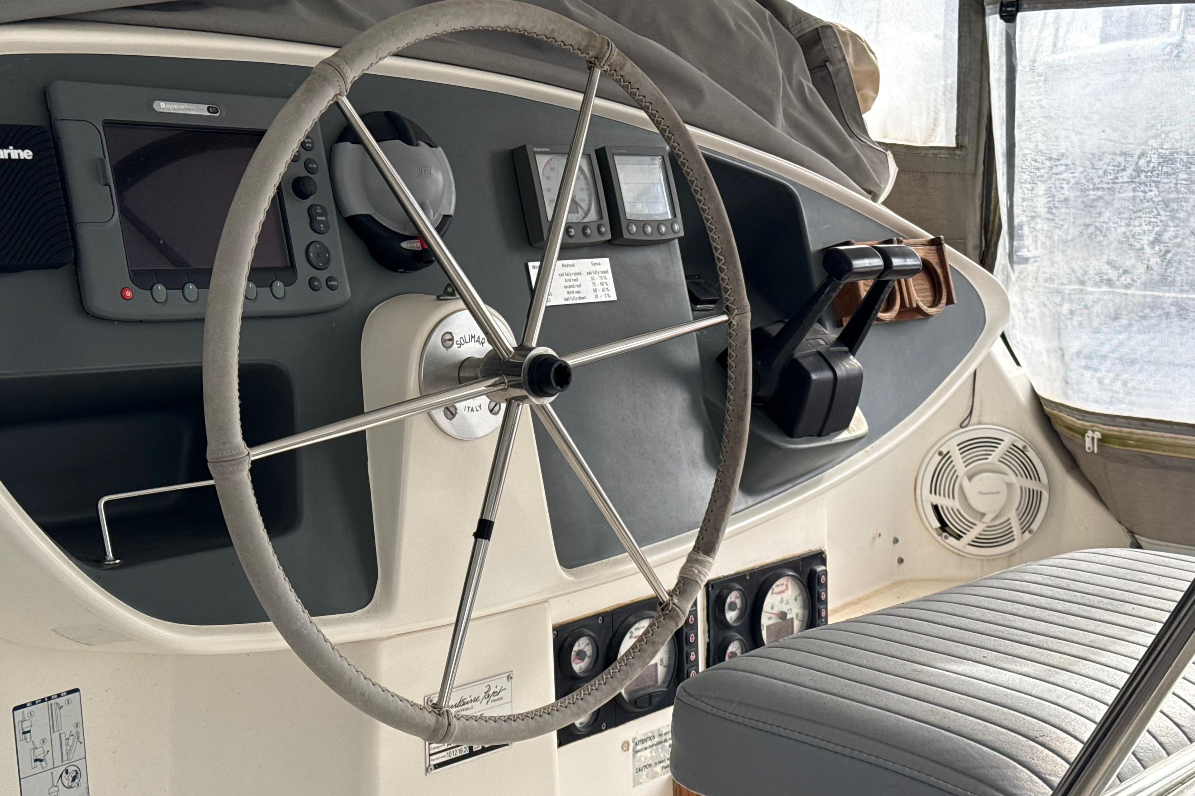 Steering wheel and controls of 2003 Fountaine Pajot Belize 43 catamaran.