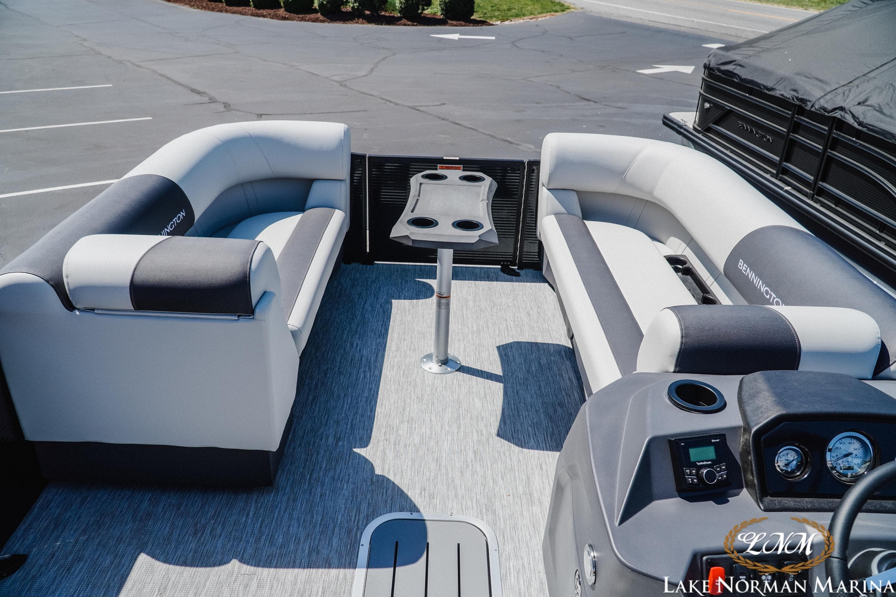 2026 Bennington 22SSB pontoon boat interior with plush seating and modern console.