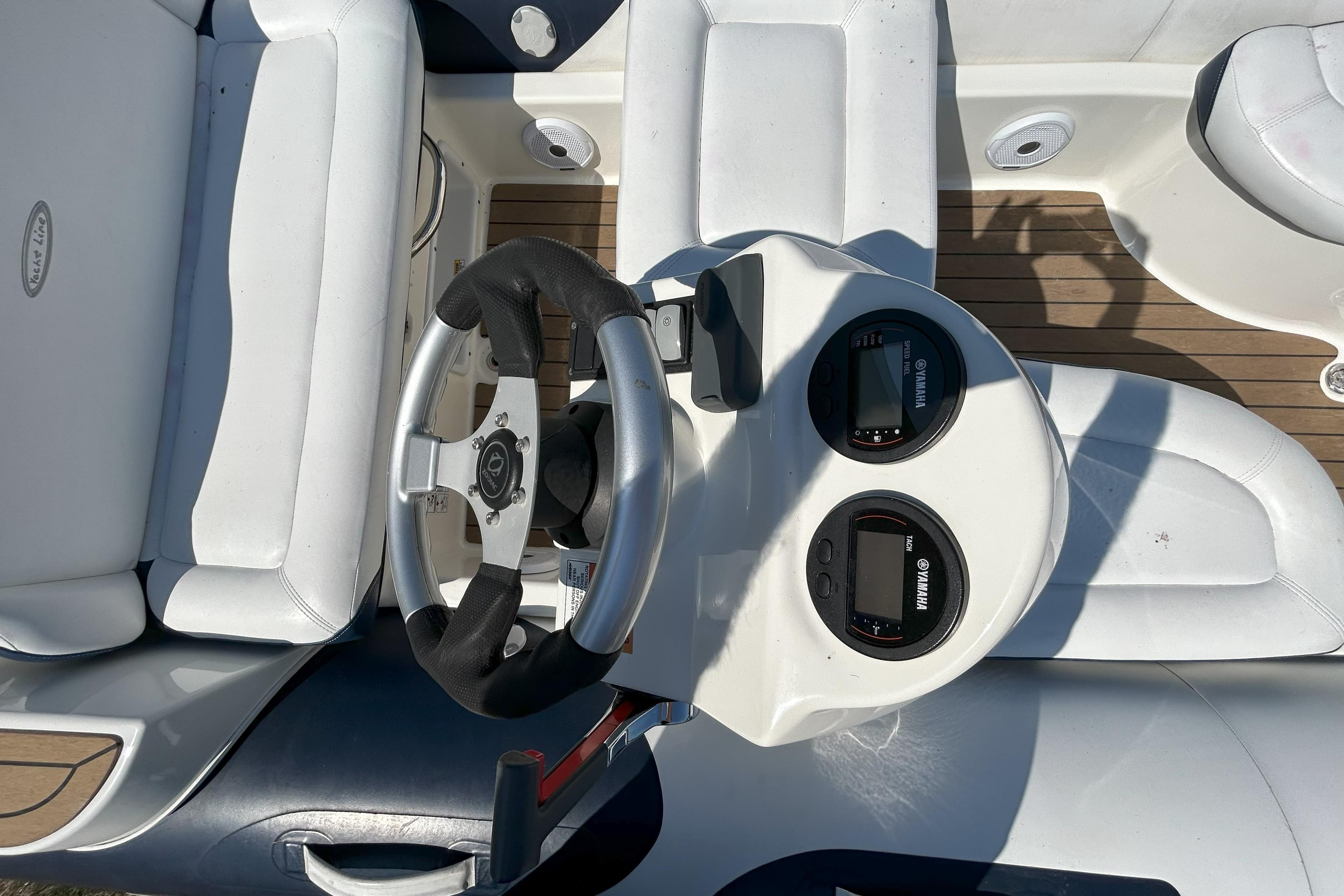 2016 Zodiac Yachtline 420 boat dashboard with steering wheel and Yamaha gauges.