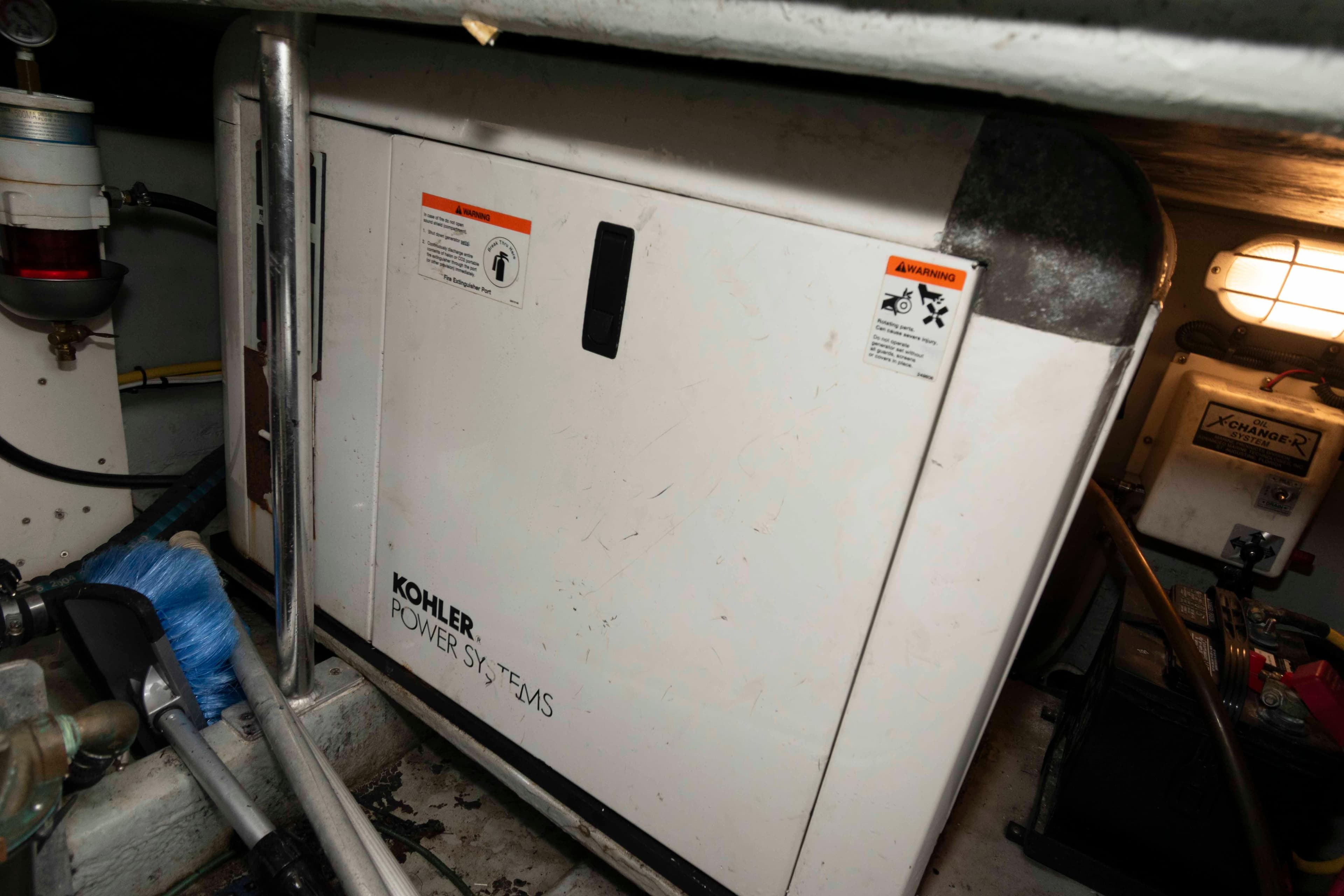 Kohler power system in 2005 Mainship 400 Trawler engine room.