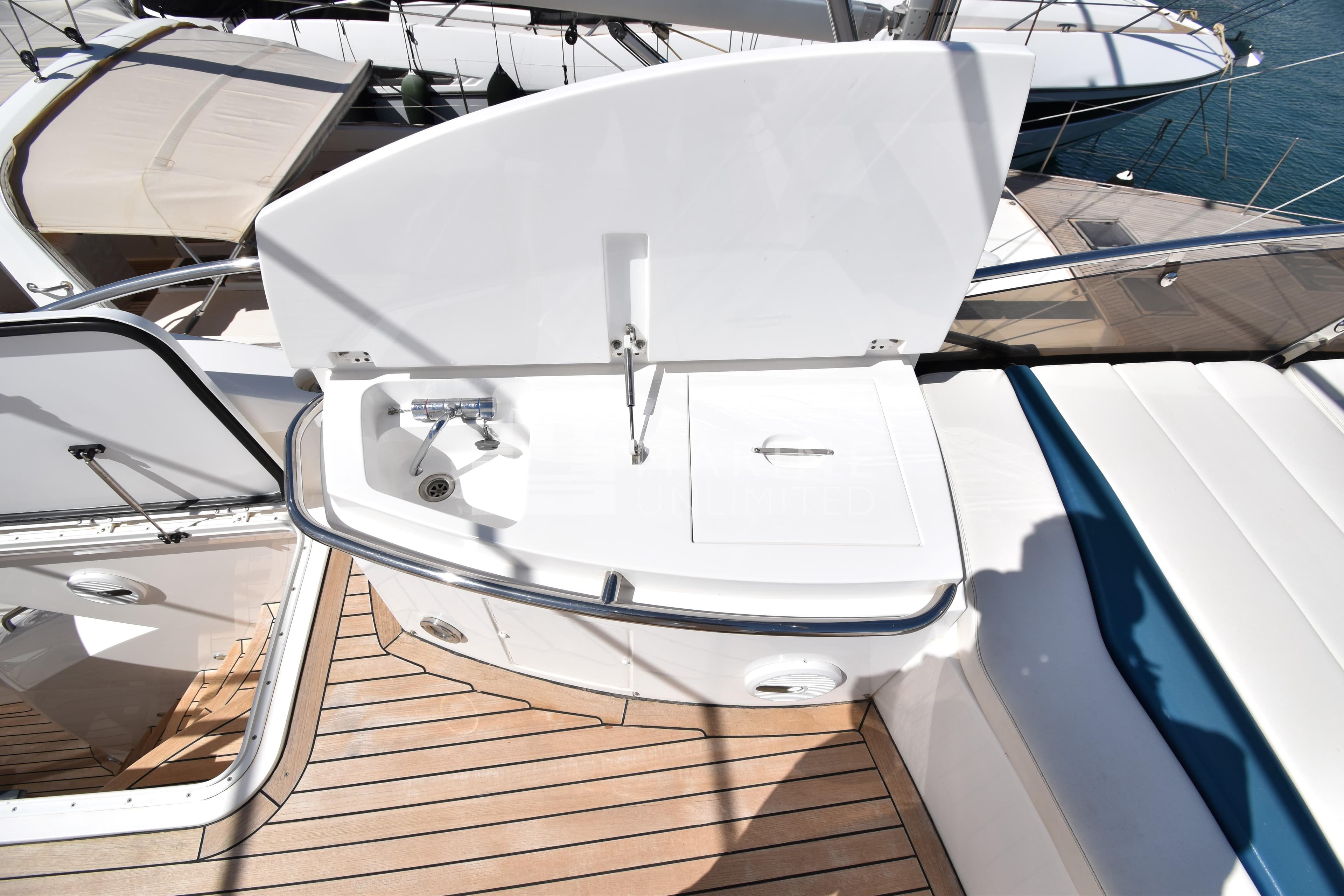 Sunseeker Manhattan 52 yacht deck with sink and storage, 2010 model.