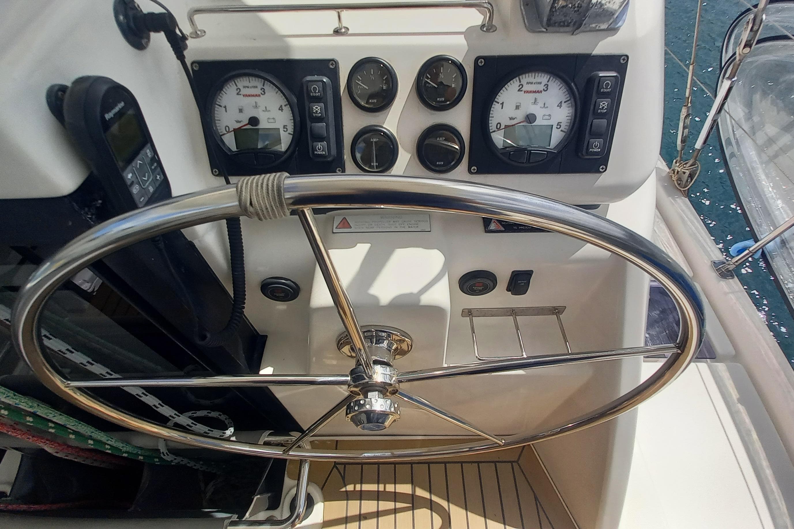 Steering wheel and control panel of a 2019 Leopard 45 yacht.