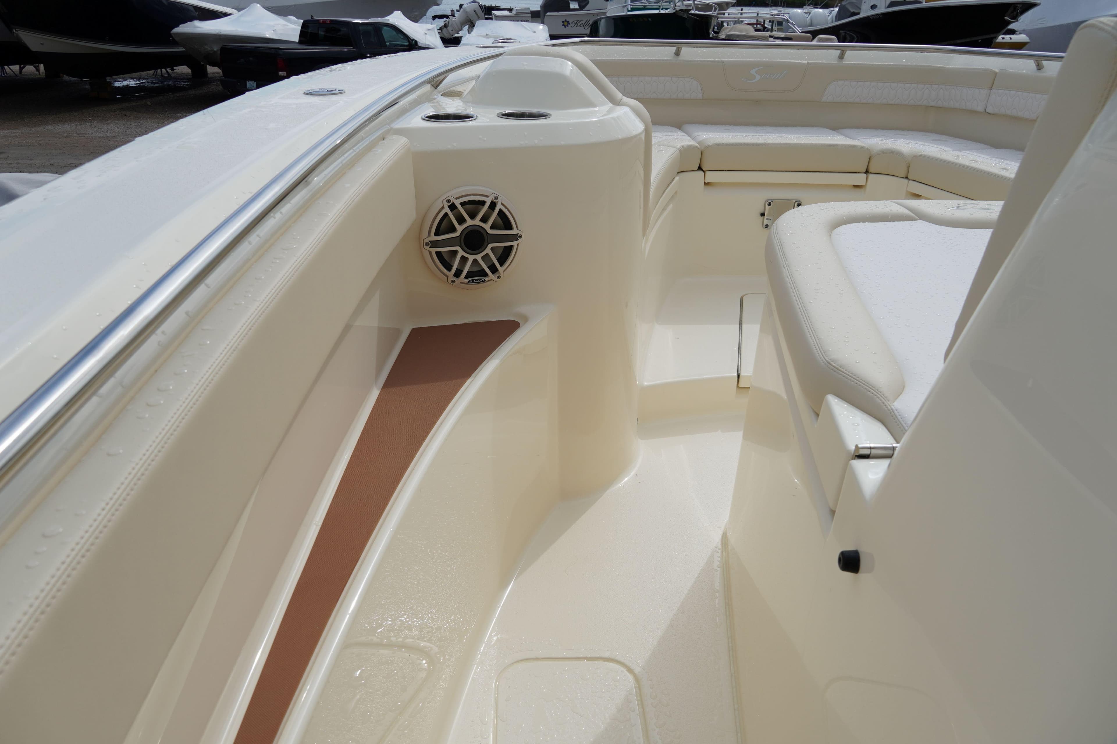 2026 Scout 288 LXF boat interior with seating and speaker detail.