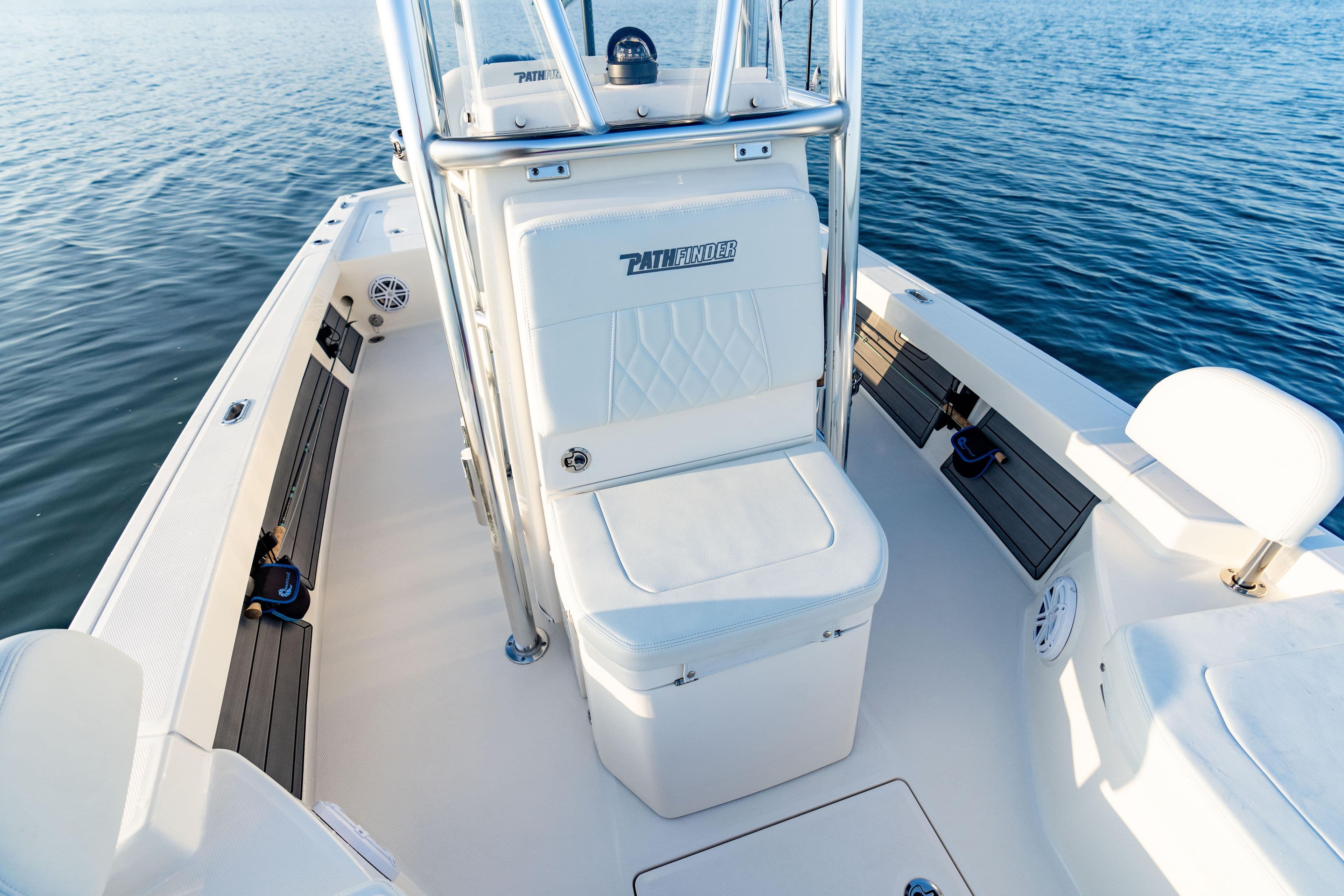 Manufacturer Provided Image: 2026 Pathfinder 2200 TRS boat interior with seating, on calm water.