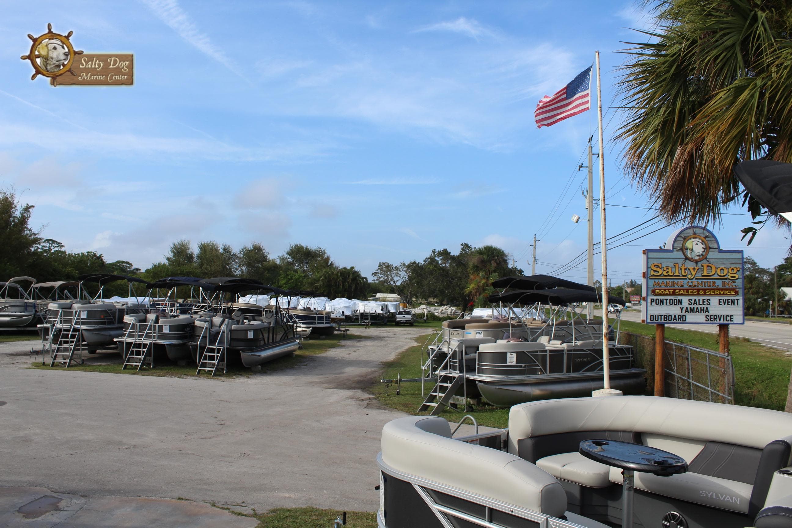 Outdoor display of 2025 Sylvan Mirage 820 PARTY FISH pontoon boats at Salty Dog Marine.