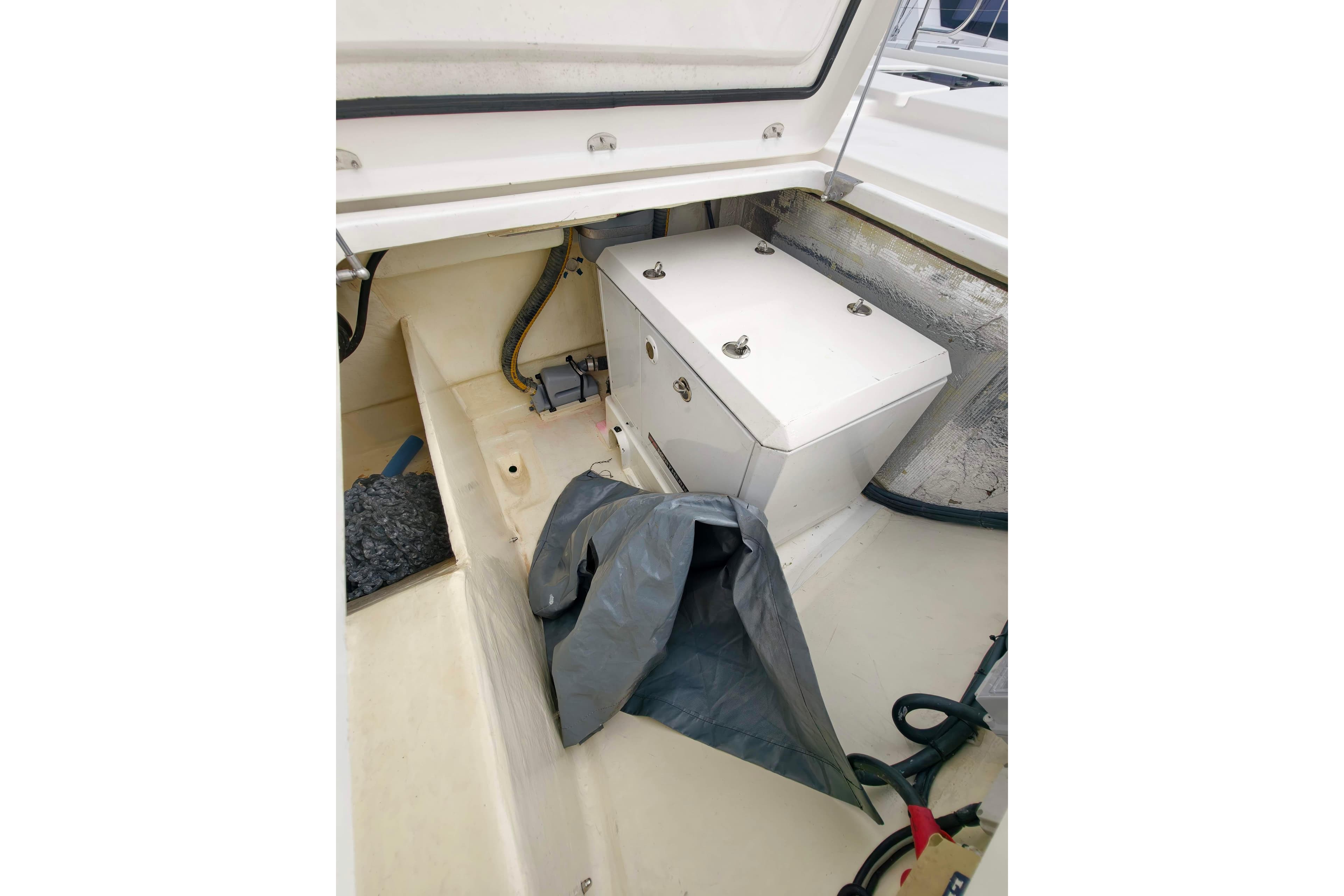 2019 Leopard 50 yacht storage compartment with equipment and cables.