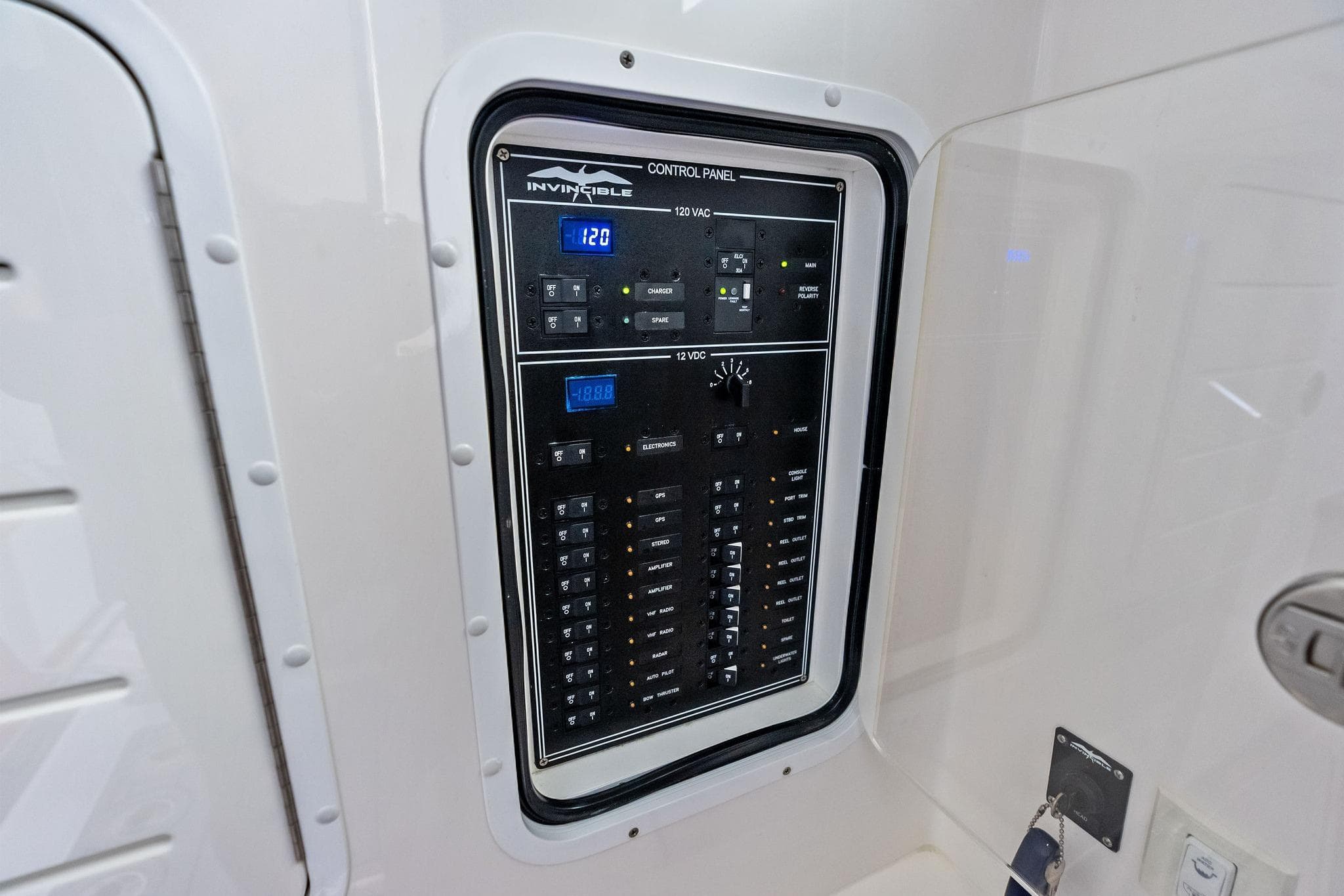 2024 Invincible 43 Open Fisherman control panel with digital displays and switches.