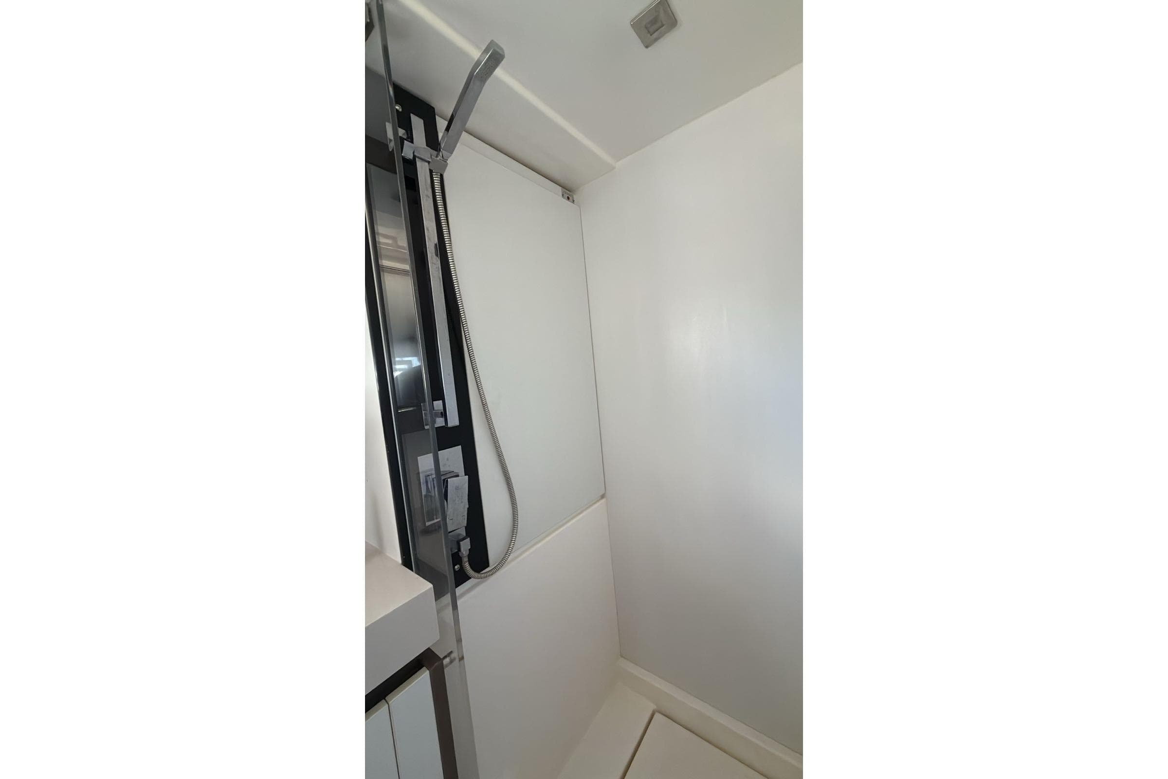 Modern shower area in 2022 Leopard 53 Powercat yacht bathroom.