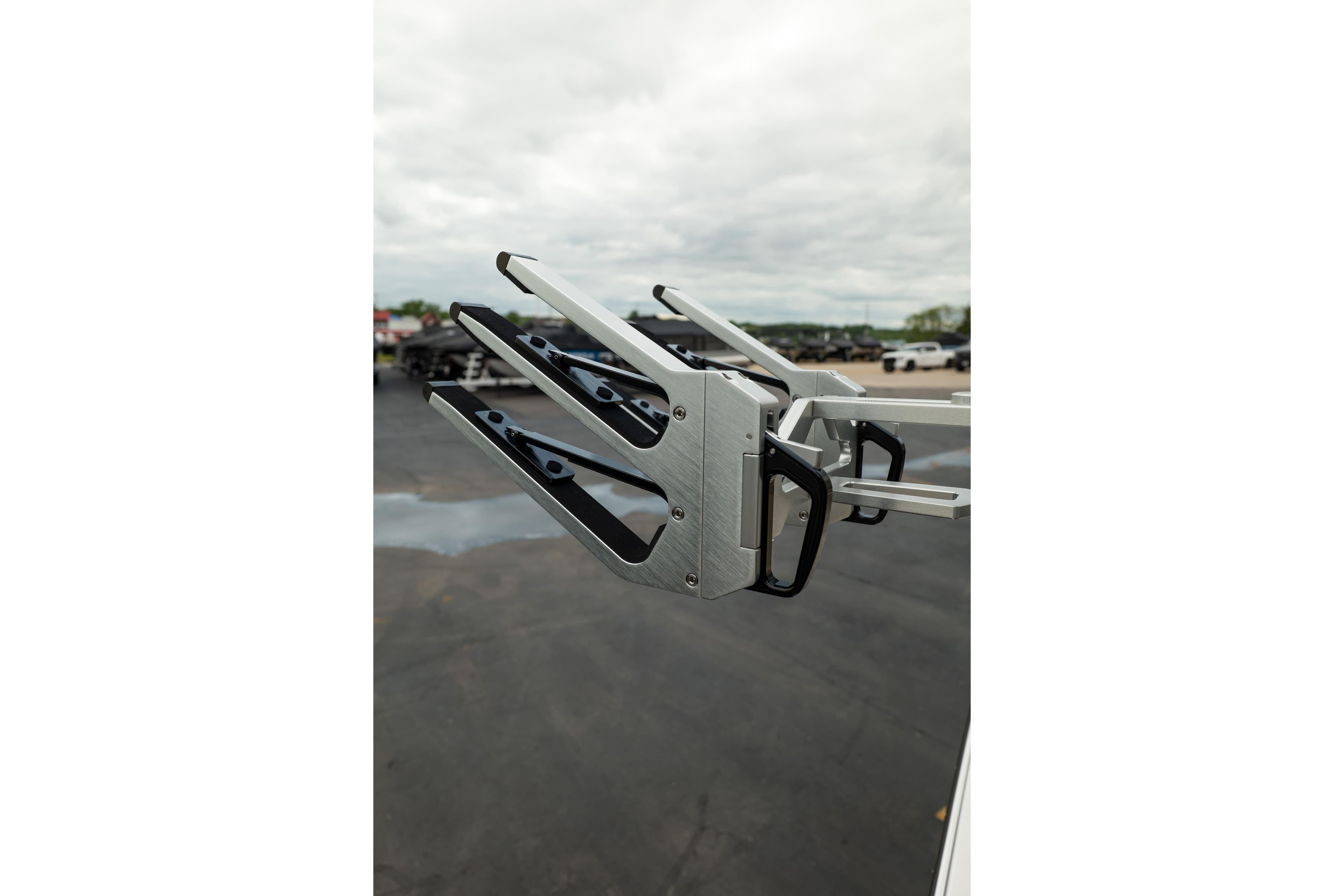 2026 MasterCraft NXT23 wakeboard rack on a cloudy day.