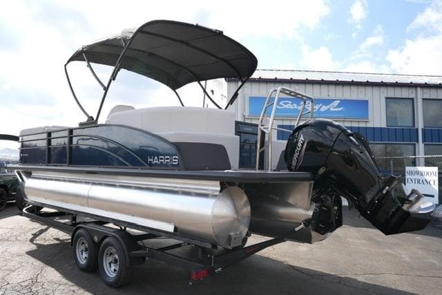 2026 Harris Cruiser 230 pontoon boat on trailer, featuring a Mercury outboard motor.