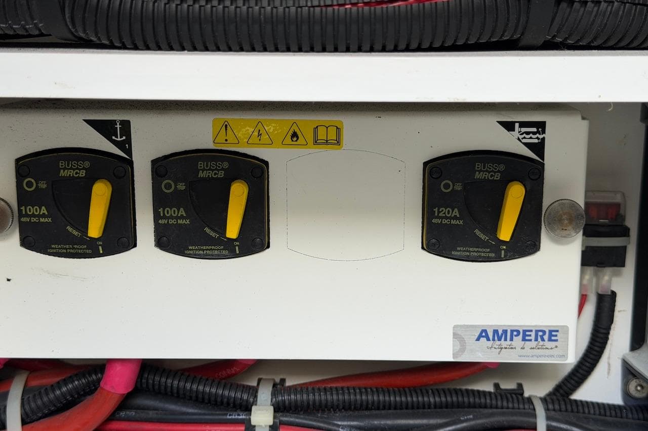 Electrical panel with circuit breakers on a 2018 Beneteau Gran Turismo 46 yacht.