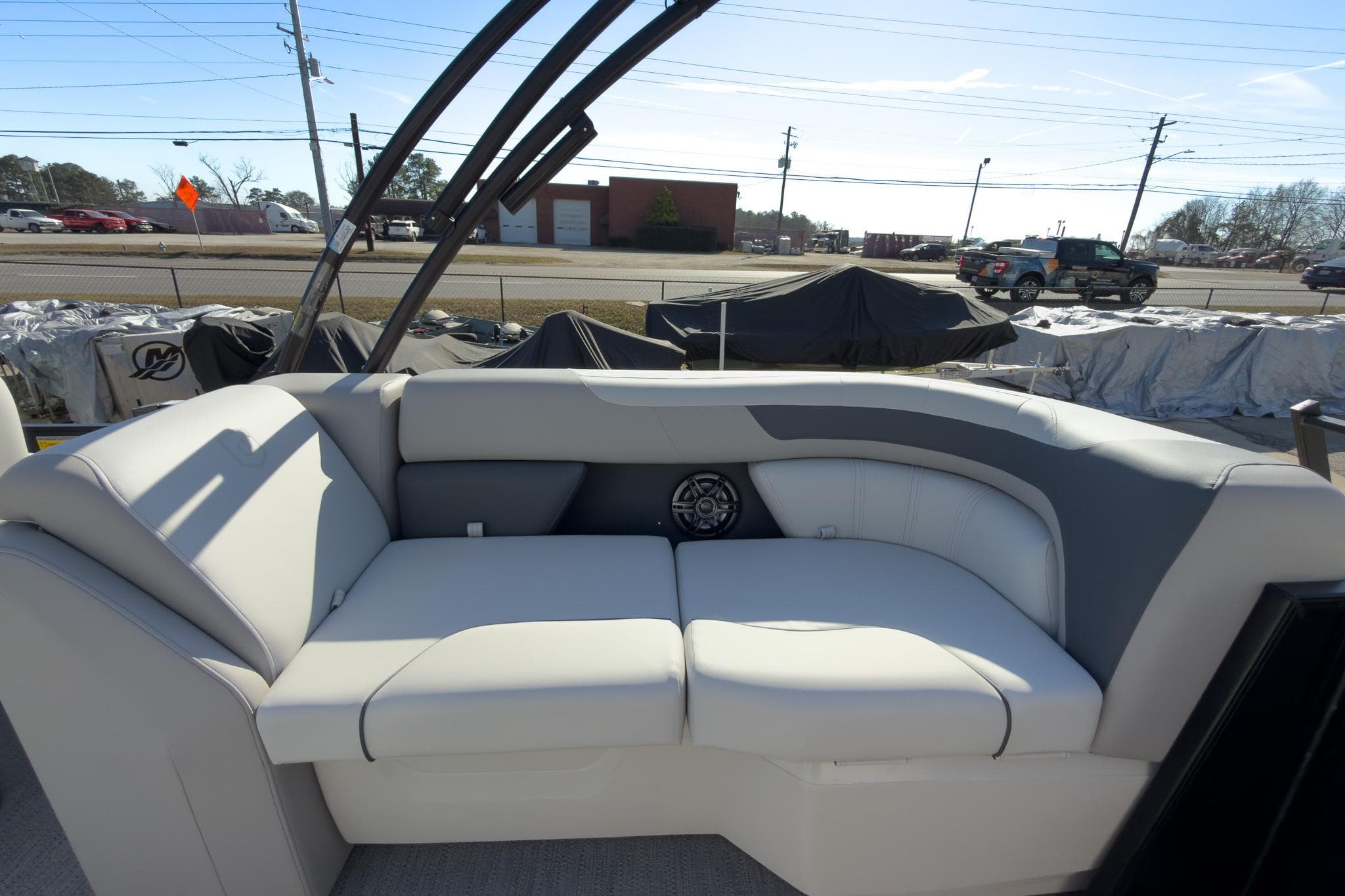 2026 Godfrey Sweetwater 22' Tritoon interior with plush seating and modern design.