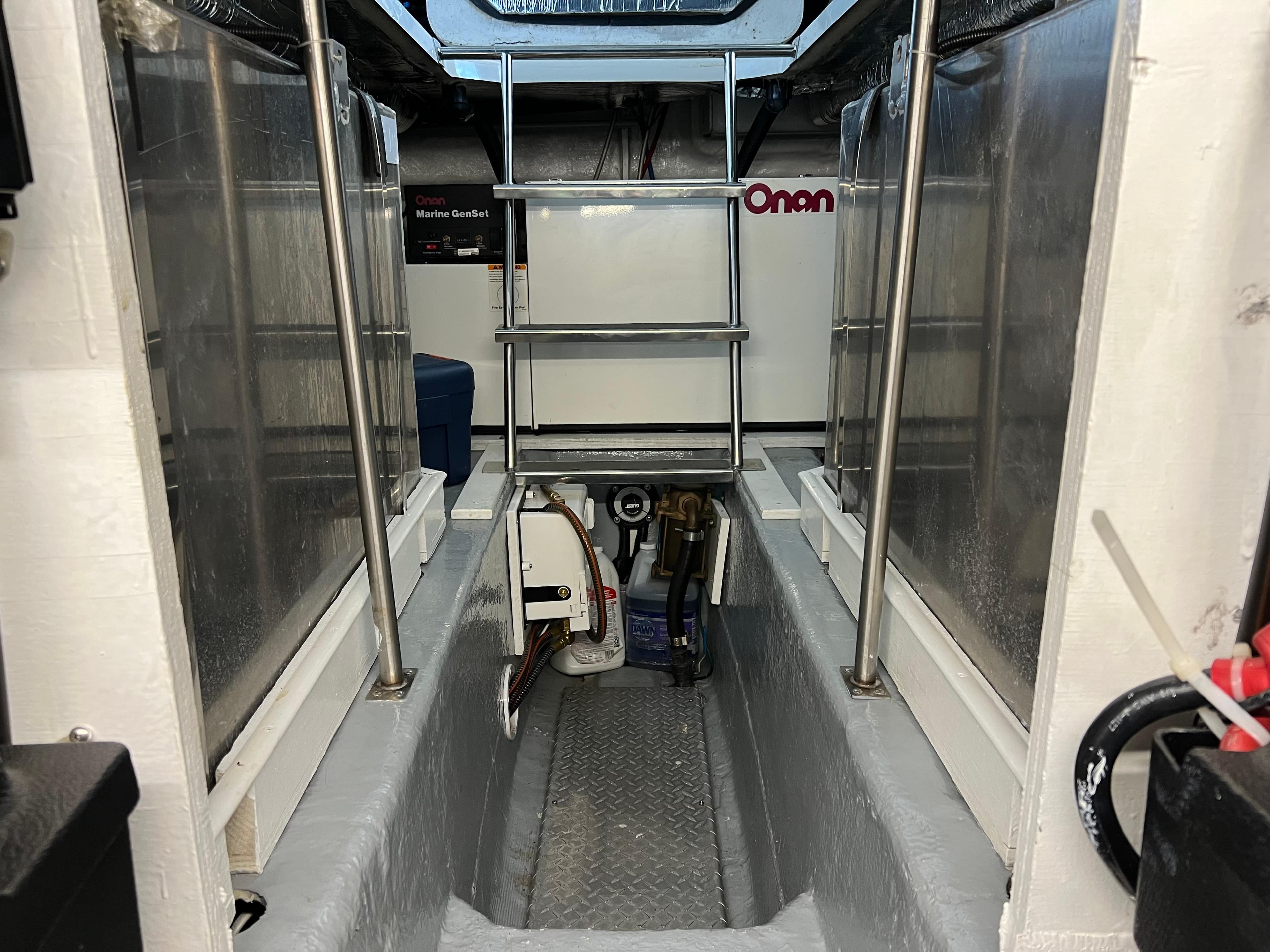 Engine room of 2001 Carver 450 Voyager Pilothouse with Onan generator.