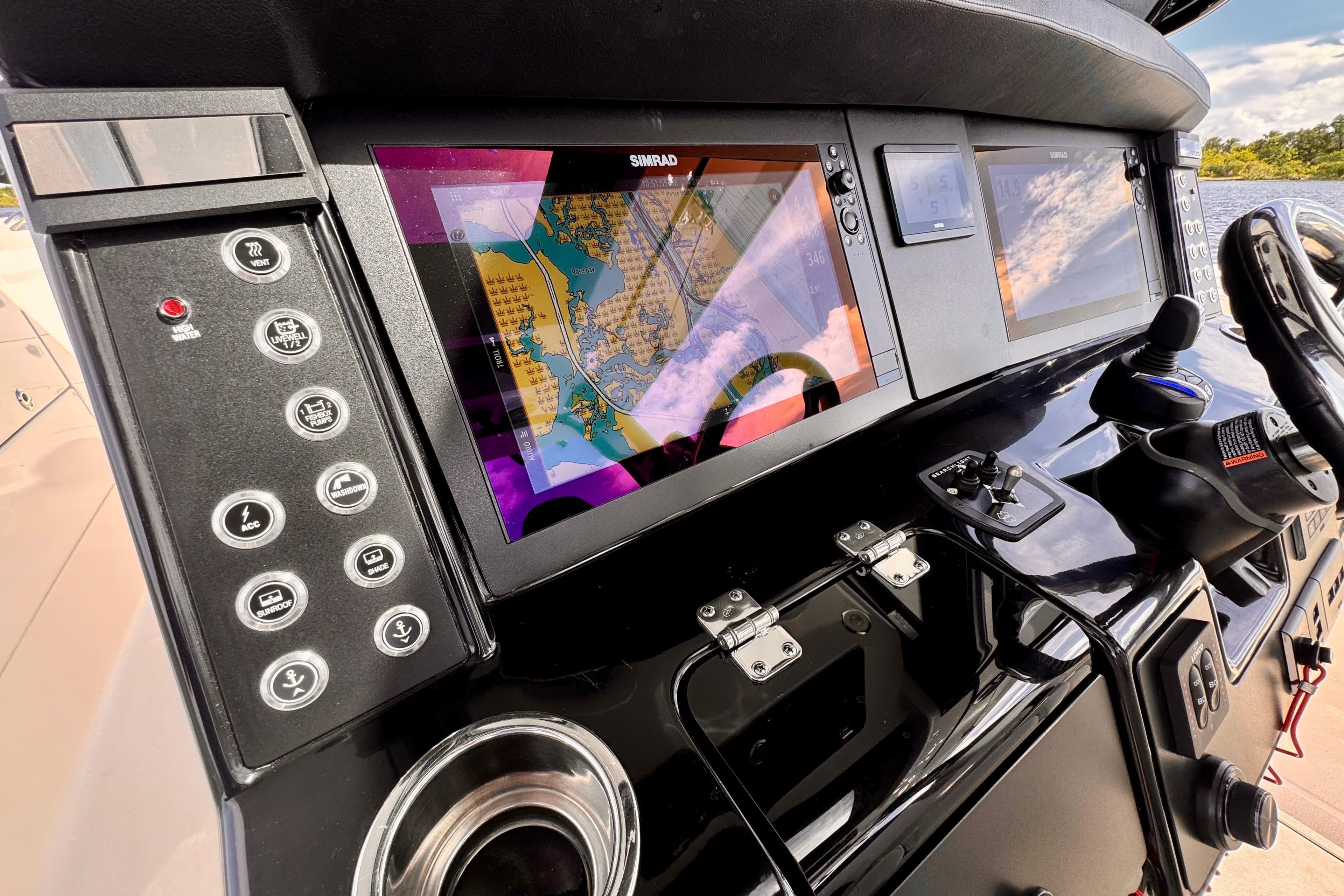 2022 Robalo R360 Center Console dashboard with navigation screens and control panel.