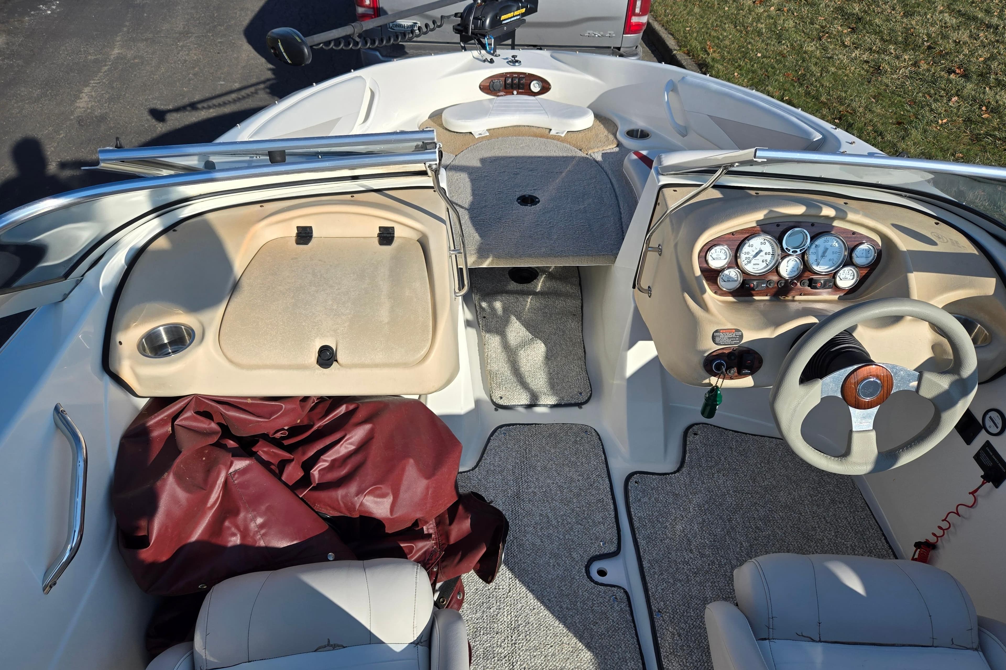 2007 Glastron GT 205 Ski & Fish boat interior with dashboard and seating.