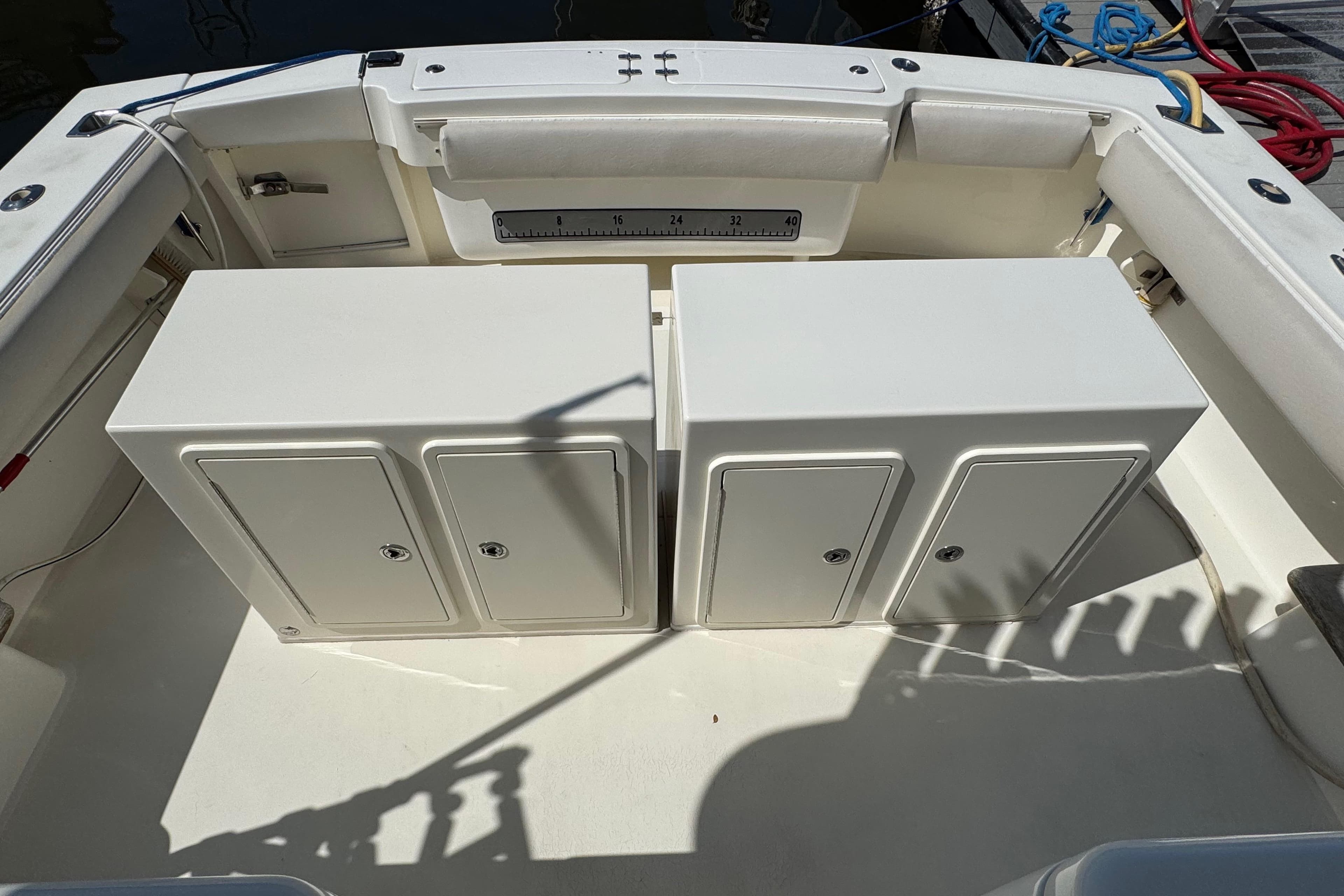 2007 Albemarle 410 Express Fisherman boat deck with storage compartments.