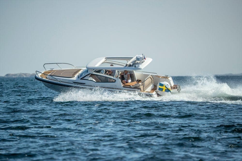 Nimbus Weekender 9 boat 2025 cruising on open sea.