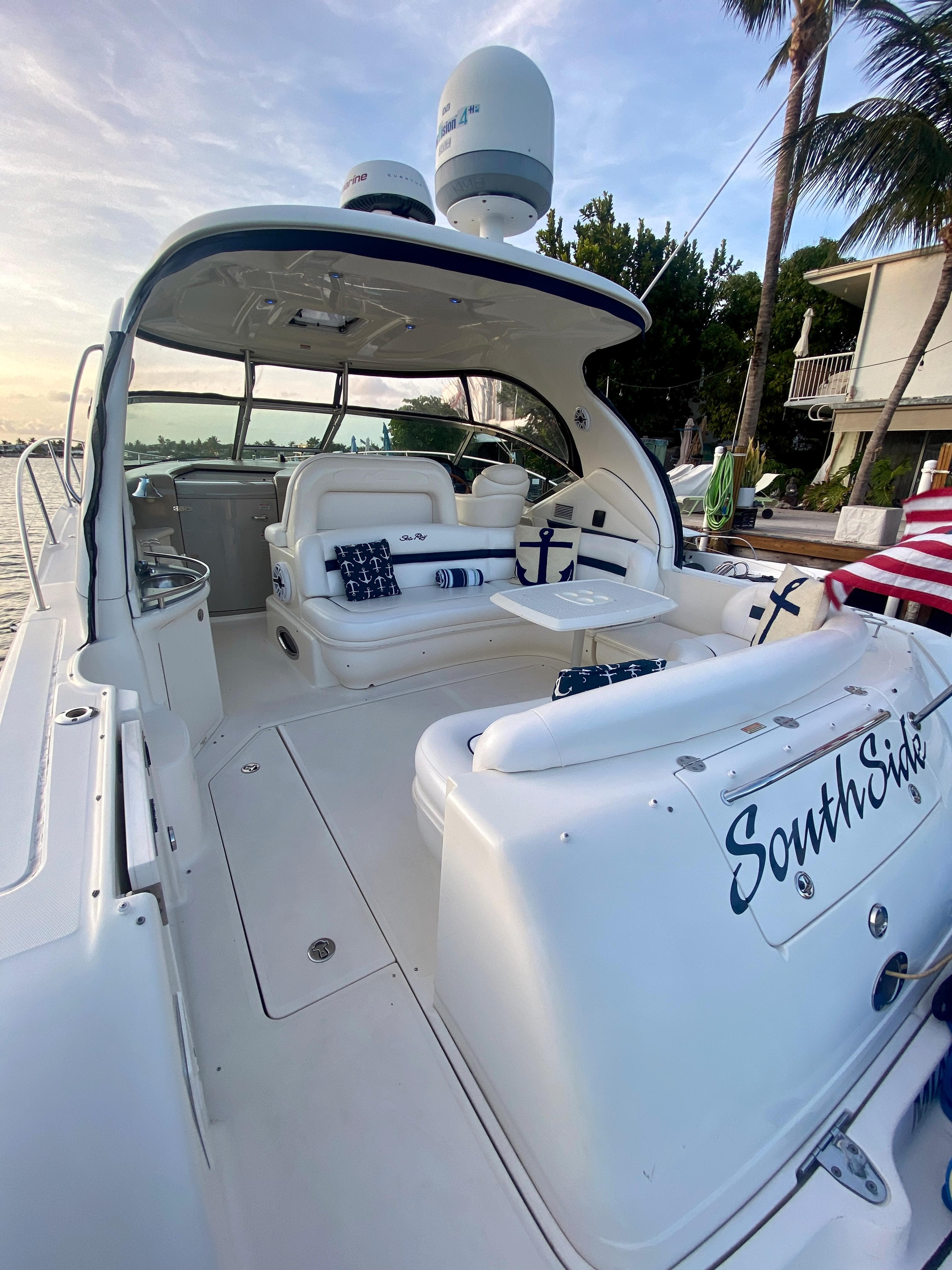 2005 Sea Ray 420 Sundancer yacht with spacious seating and South Side name on the stern.