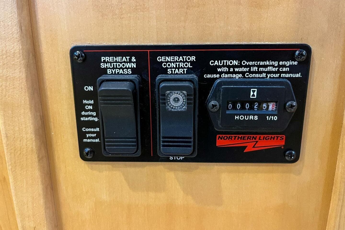 Control panel of Northern Lights generator on 2023 Island Packet 439 yacht.
