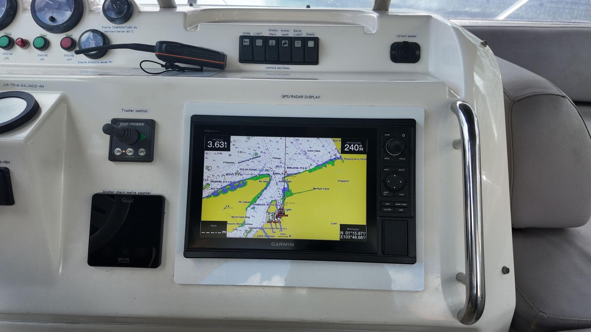 Control panel of a 2009 Azimut 58 yacht with navigation display.