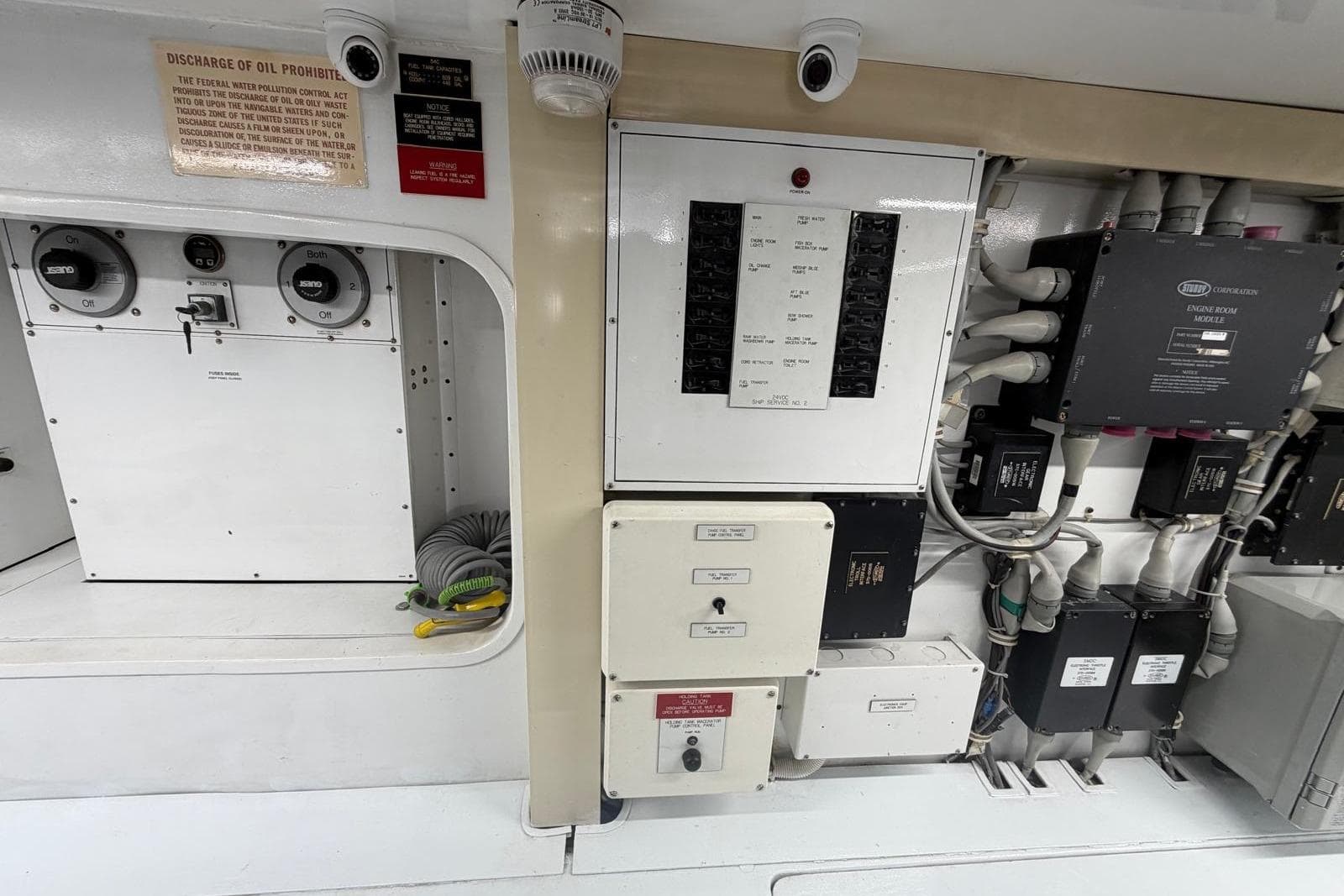 Electrical panel and controls inside a 2003 Hatteras 54 Convertible yacht.