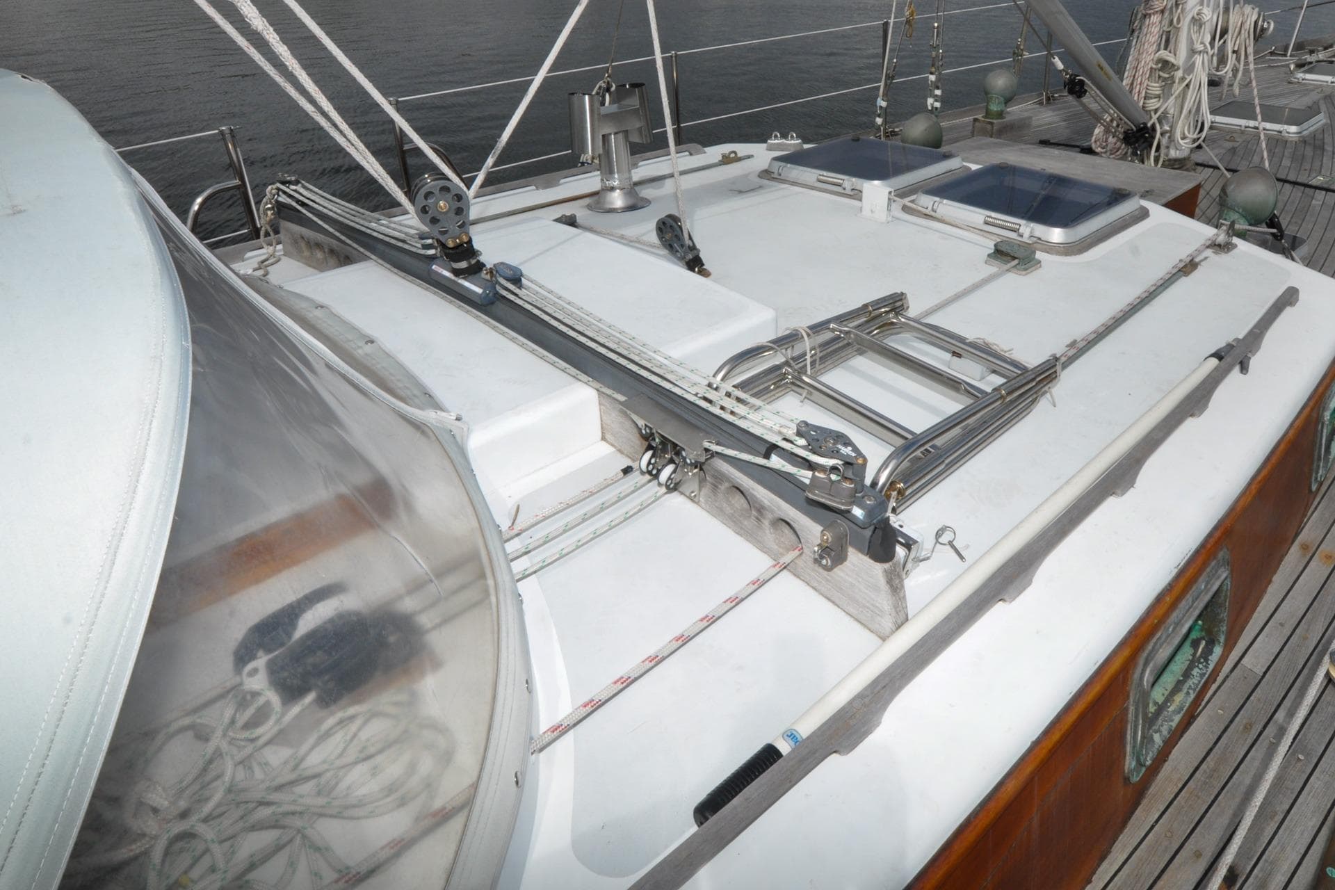 1987 Custom Wittholtz/Luzier Sloop/Cutter deck with rigging and hatches, showcasing nautical craftsmanship.