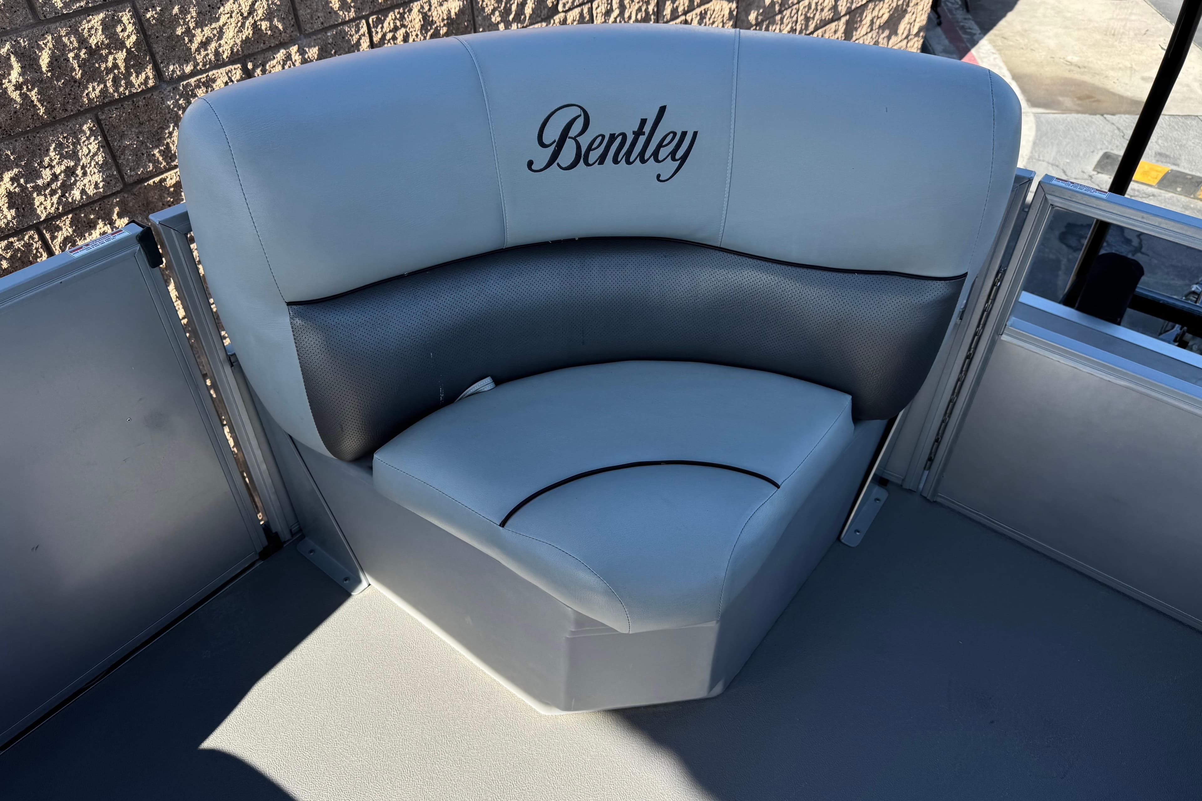 2018 Bentley Pontoons 180 CRUISE boat seat with elegant gray upholstery.