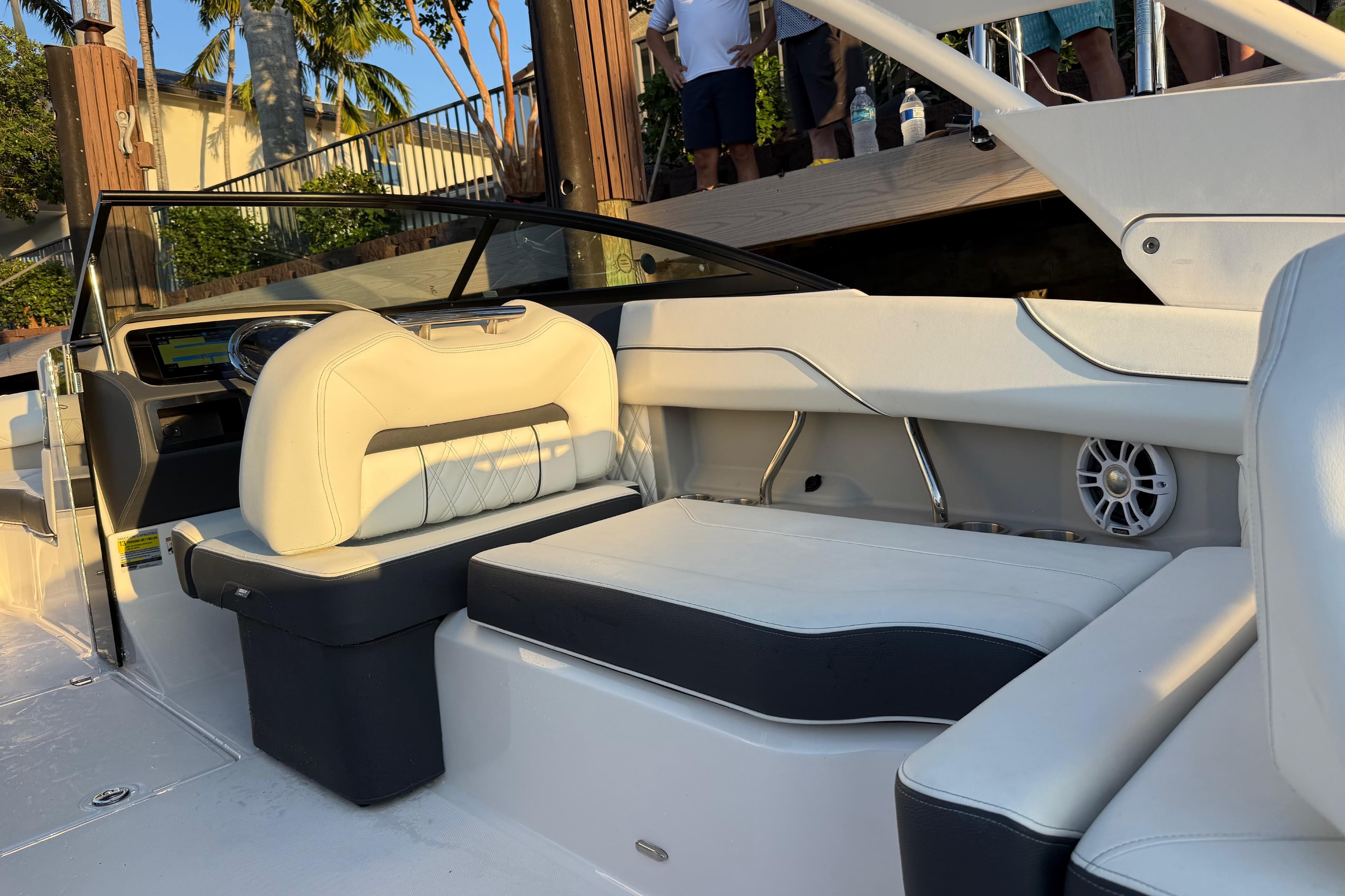 2024 Regal LX2 boat interior with luxurious white seating and modern design.