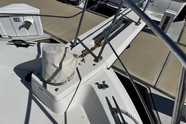 1986 Carver 4207 Aft Cabin Motor Yacht deck with railing and dock view.