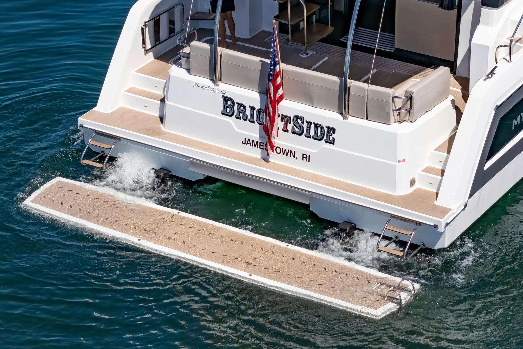 2024 Fountaine Pajot MY5 yacht with swim platform, docked in calm waters.