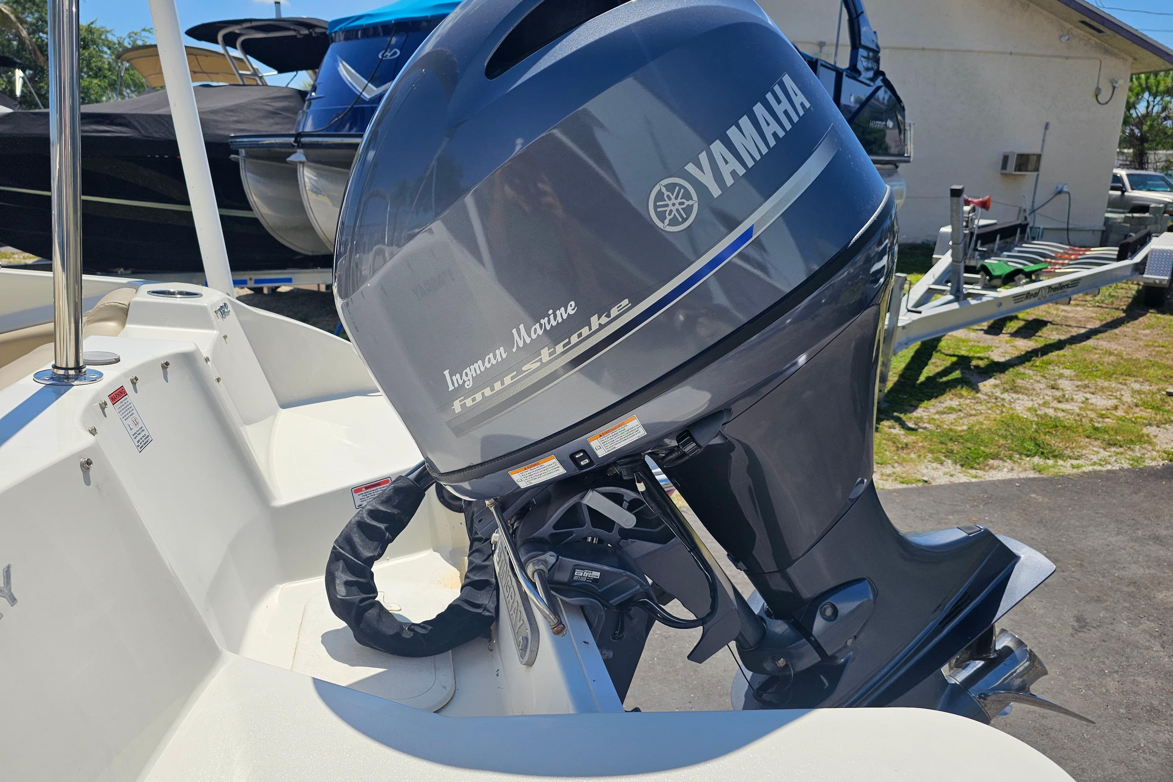 2019 Stingray 182 SC boat with Yamaha four-stroke outboard motor in a sunny outdoor setting.