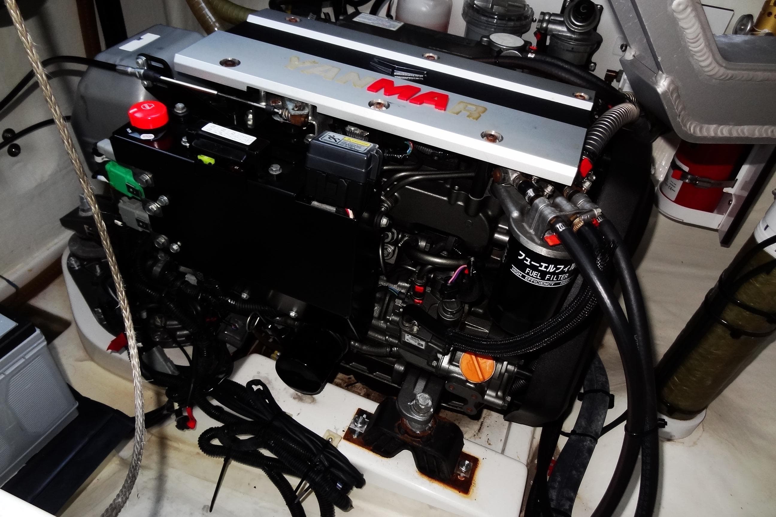 Engine compartment of 2024 Robertson and Caine Leopard 42 catamaran, featuring Yanmar diesel engine.