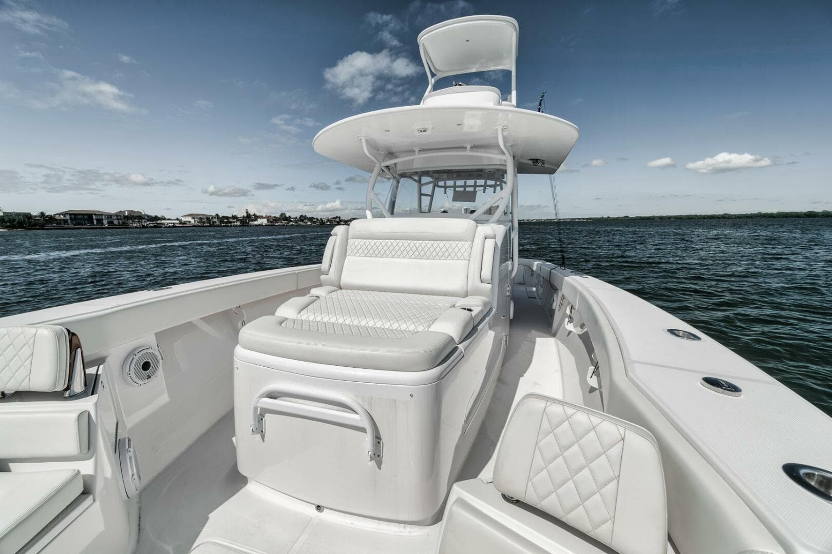 2023 Jupiter 40 boat with luxurious seating on open water.